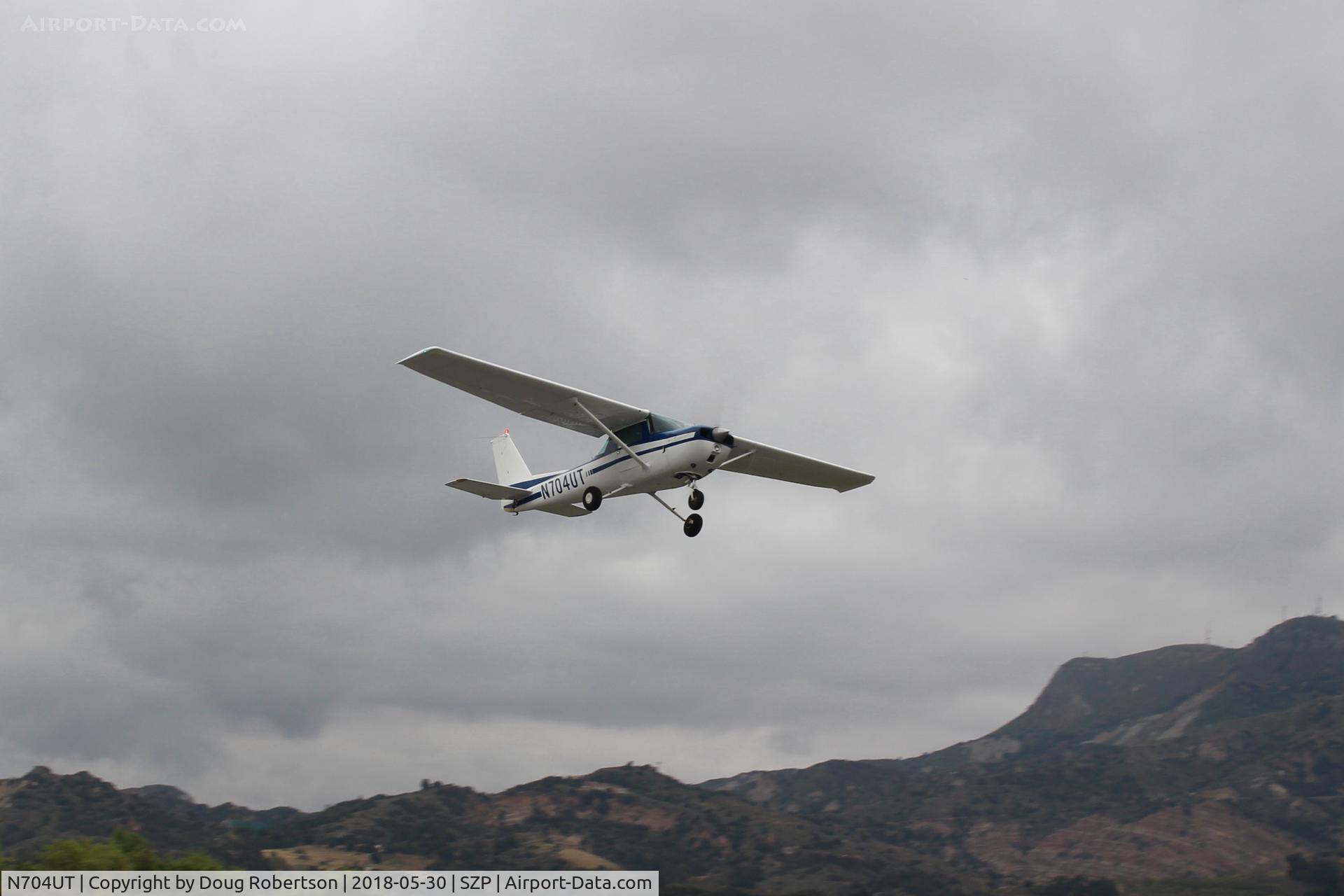 N704UT, 1976 Cessna 150M C/N 15078891, 1976 Cessna 150M, Continental O-200 100 Hp, initial takeoff climb Rwy 22