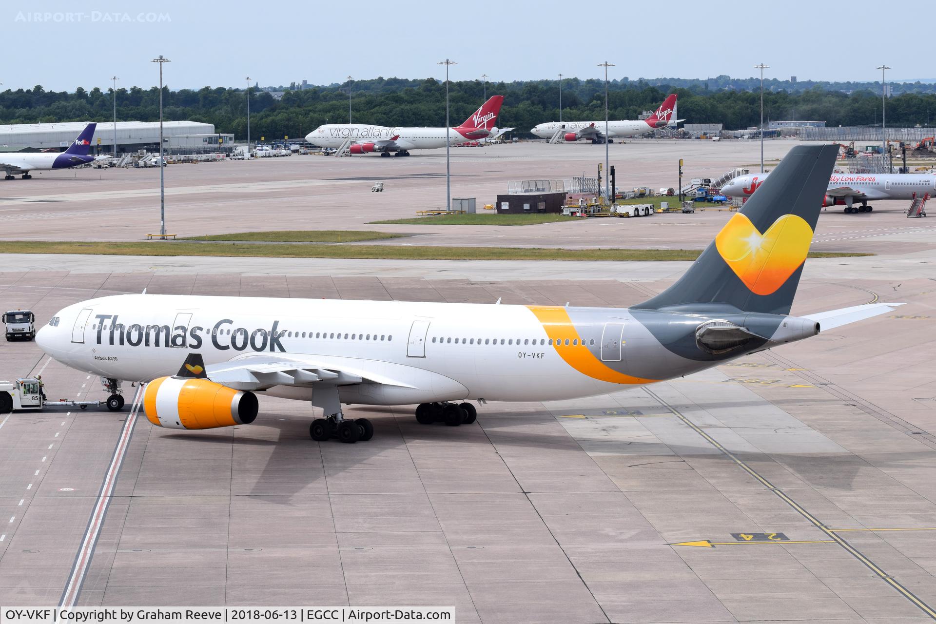 OY-VKF, 1999 Airbus A330-243 C/N 309, Being pushed back at Manchester.