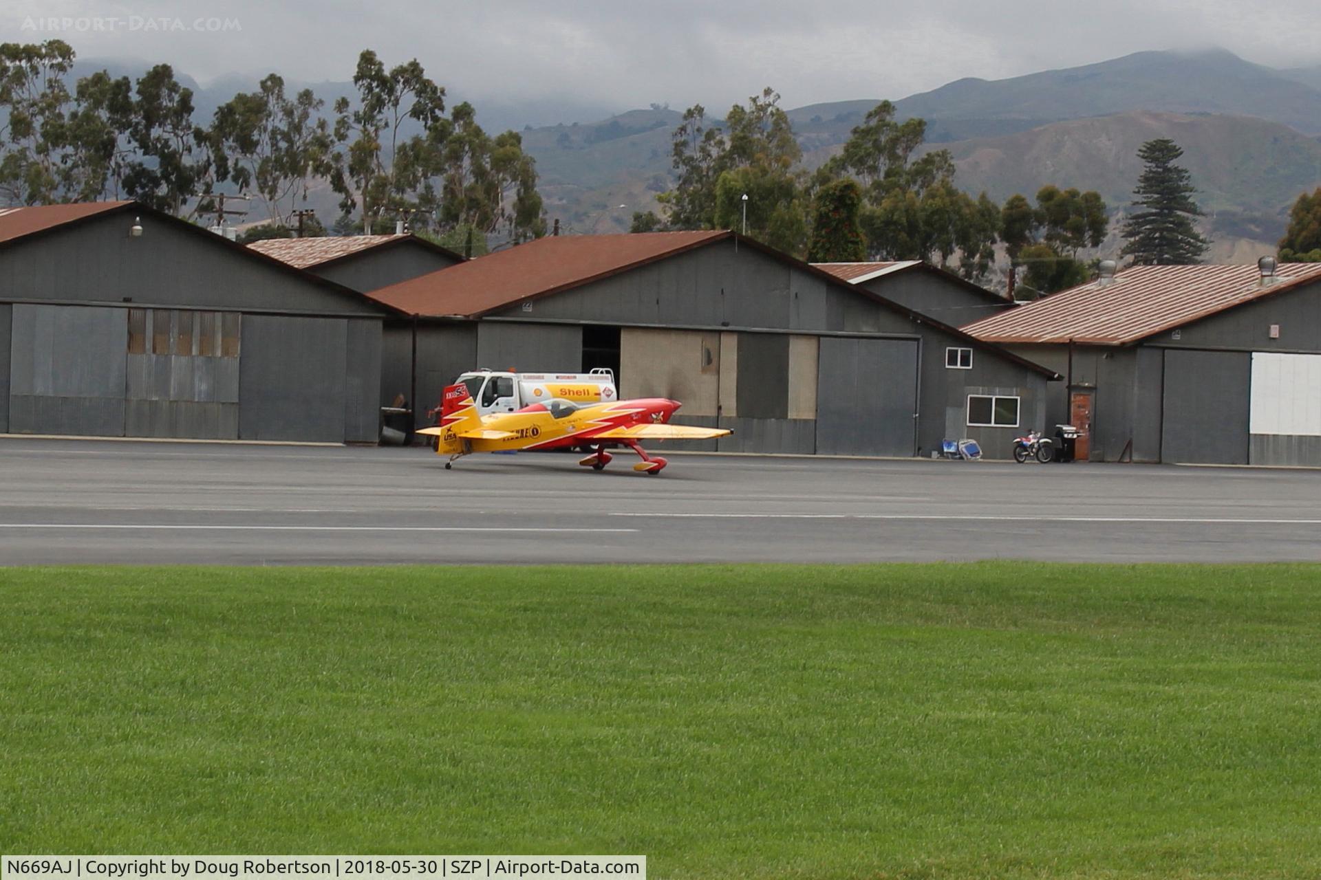 N669AJ, Extra EA-330SC C/N SC001E, Extraflugzeugbau Produktions EA330/SC, Lycoming IO-540-L1B5D 300 Hp  modified to 330 Hp?, Experimental class, taxi to hangar area