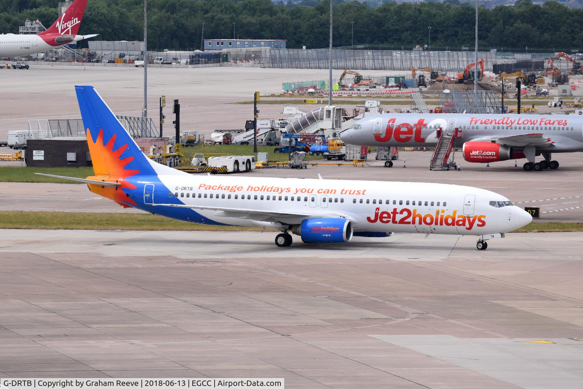 G-DRTB, 1999 Boeing 737-86N C/N 28610, Just landed at Manchester.