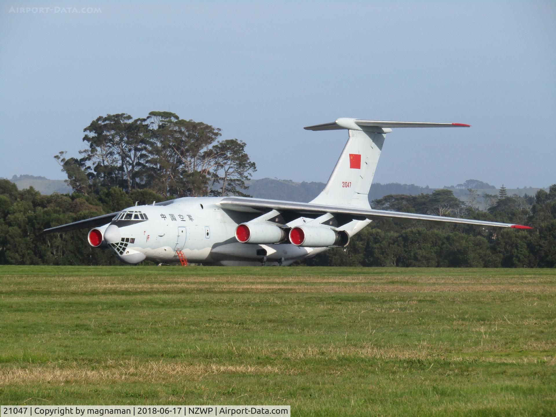 21047, 1993 Ilyushin IL-76MD C/N 1033417550, hiding at back side of air abse
