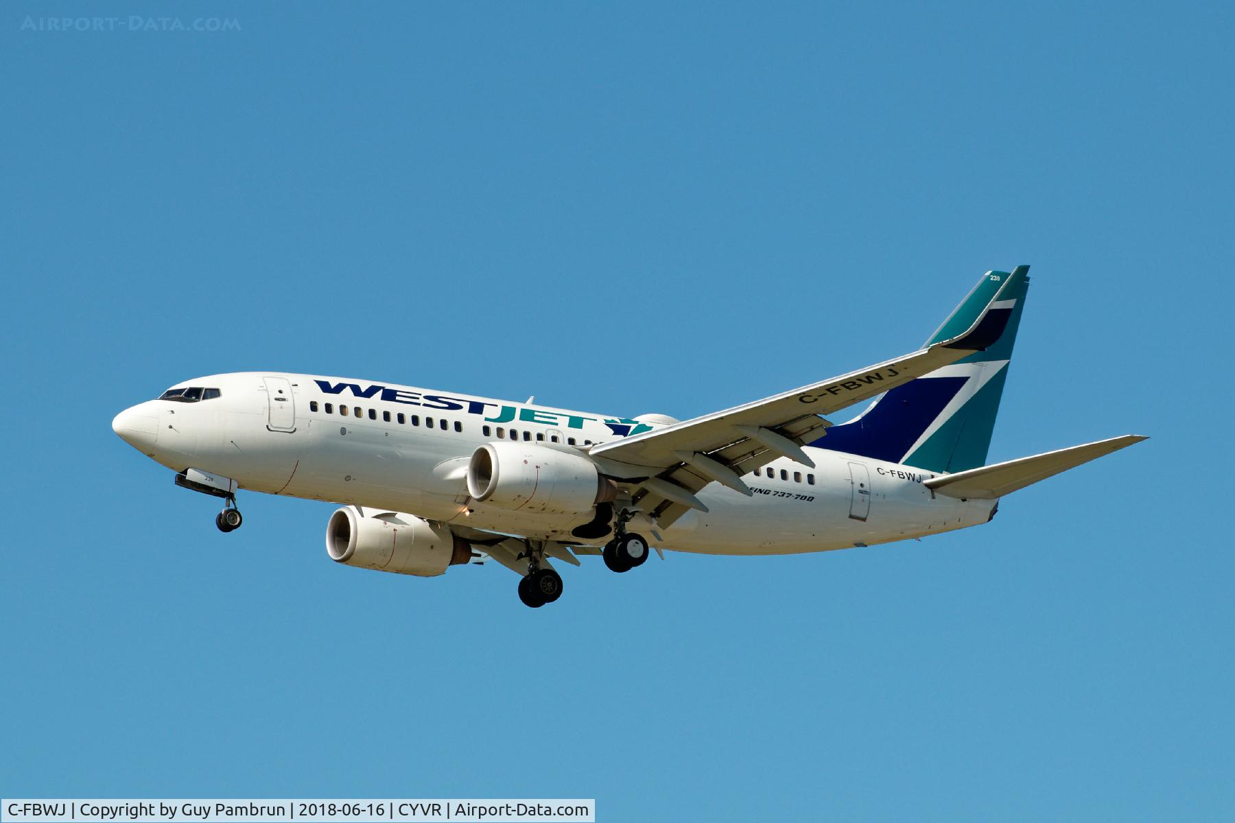 C-FBWJ, 2005 Boeing 737-7CT C/N 32767, Landing on 26R