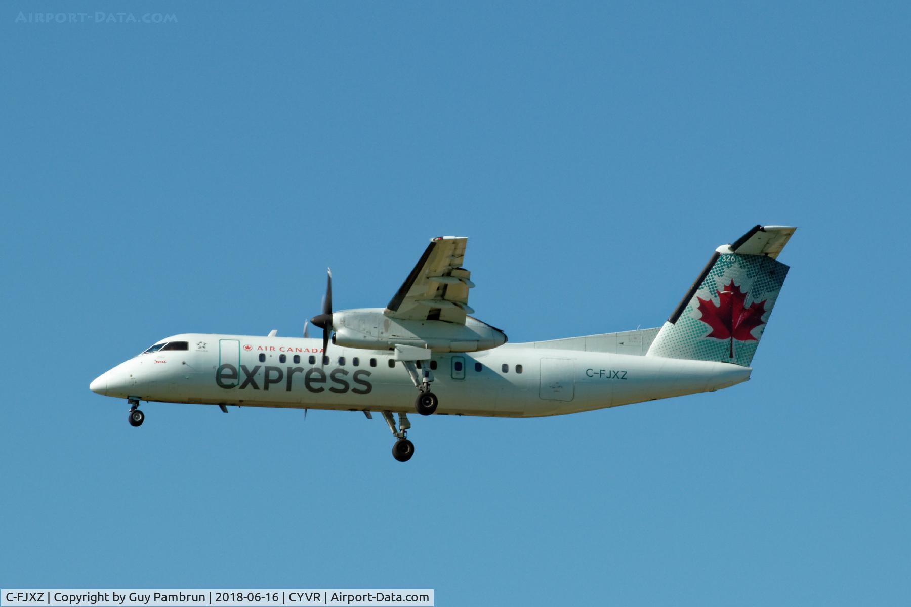 C-FJXZ, 1991 De Havilland Canada DHC-8-311 Dash 8 C/N 264, Landing on 26R