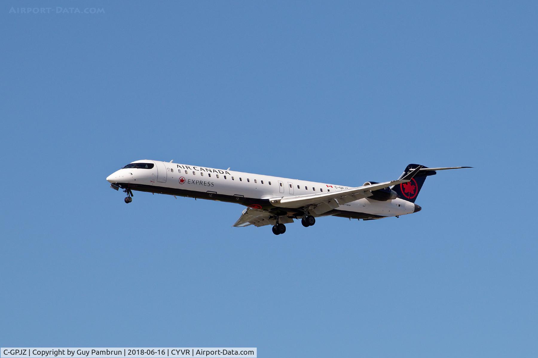 C-GPJZ, 2005 Canadair CRJ-705ER (CL-600-2D15) Regional Jet C/N 15055, Landing on 26R