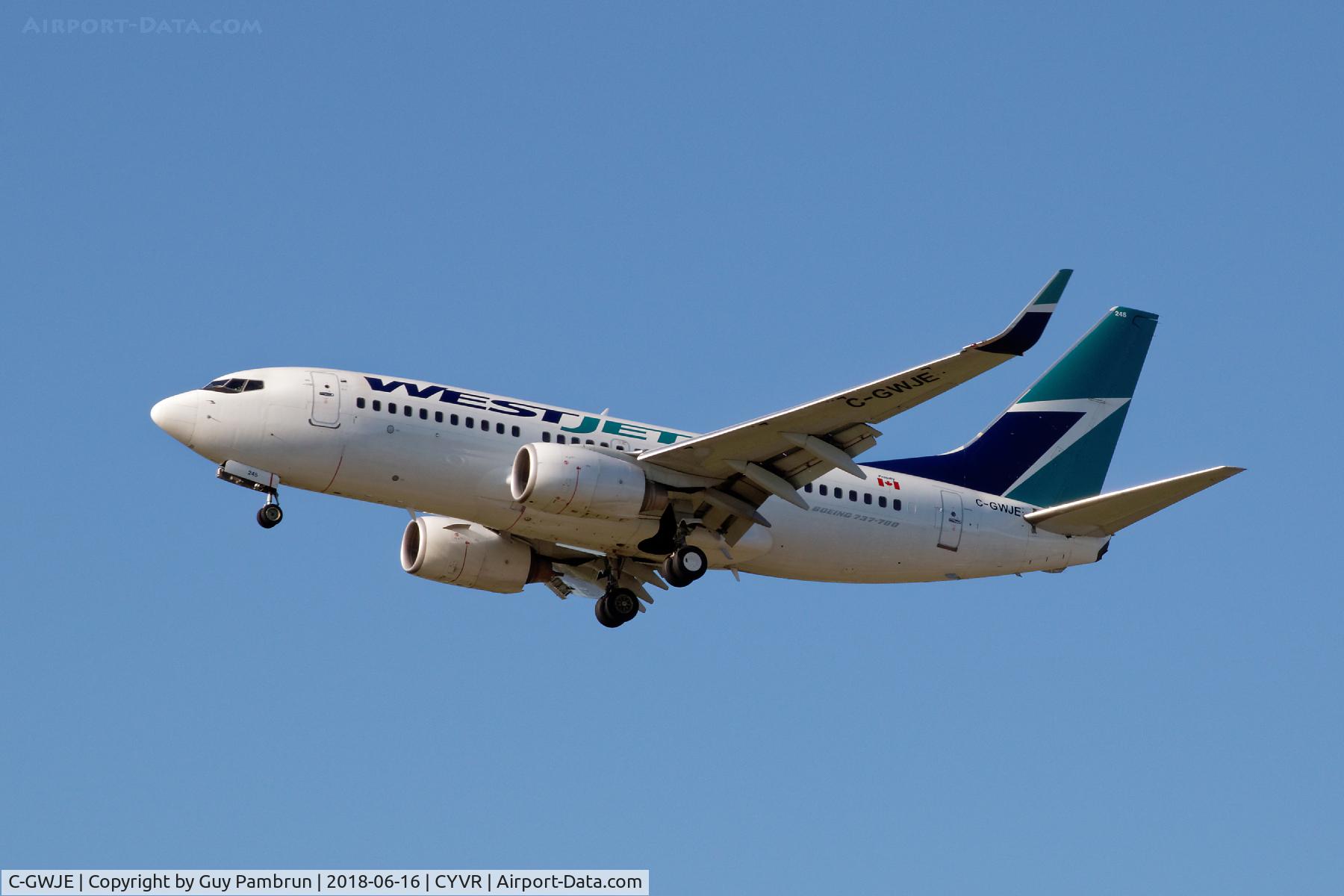 C-GWJE, 2007 Boeing 737-7CT C/N 35078, Landing on 26R
