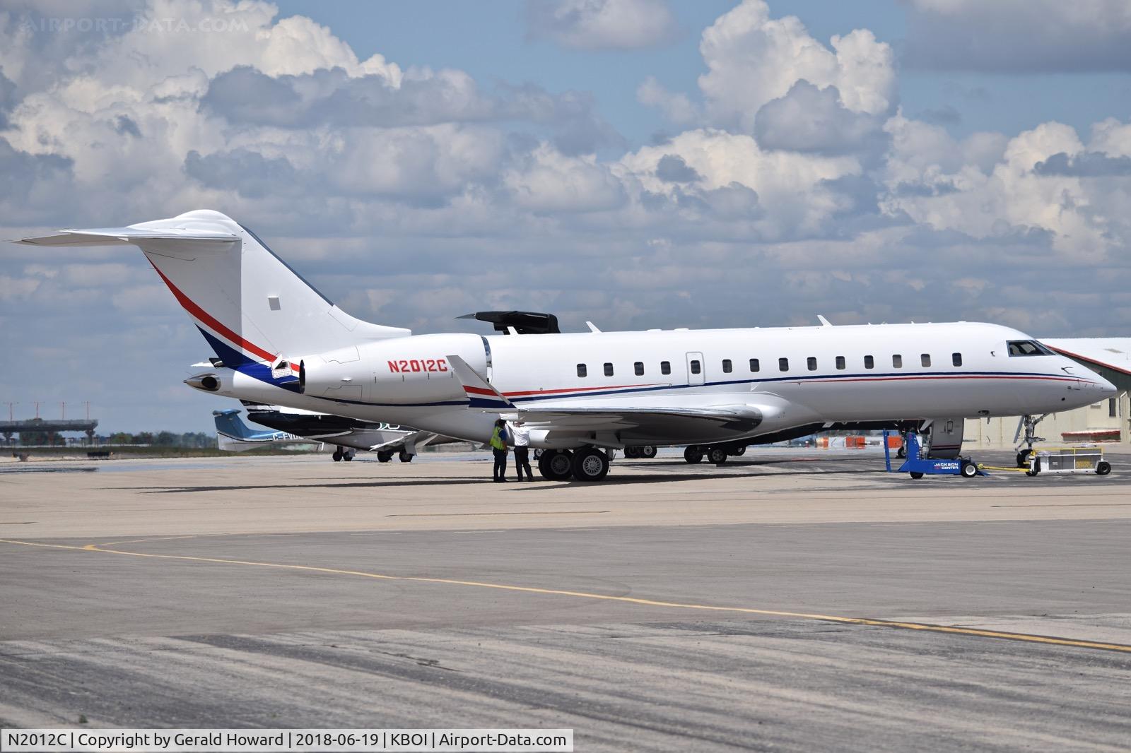 N2012C, 2000 Bombardier Global Express (BD-700-1A10) C/N 9074, Parked on the north GA ramp getting service. 2000 Bombardier BD-700-1A10 Global Express.