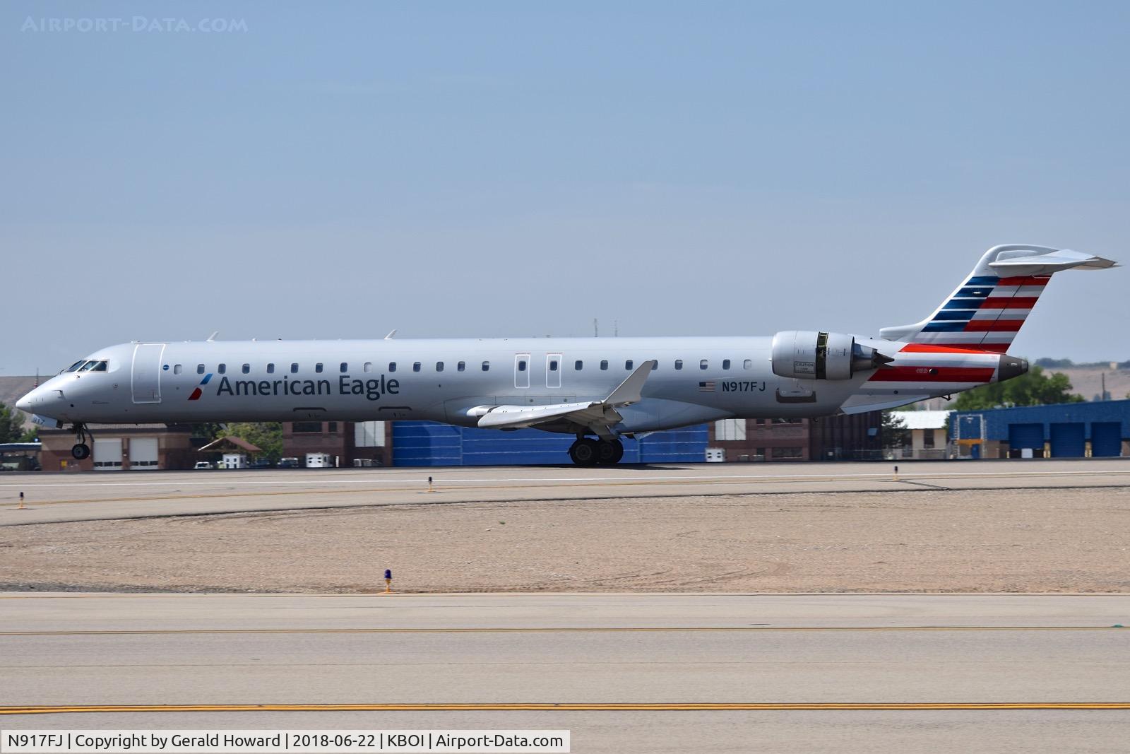 N917FJ, 2004 Bombardier CRJ-900ER (CL-600-2D24) C/N 15017, Landing roll out on RWY 10L.