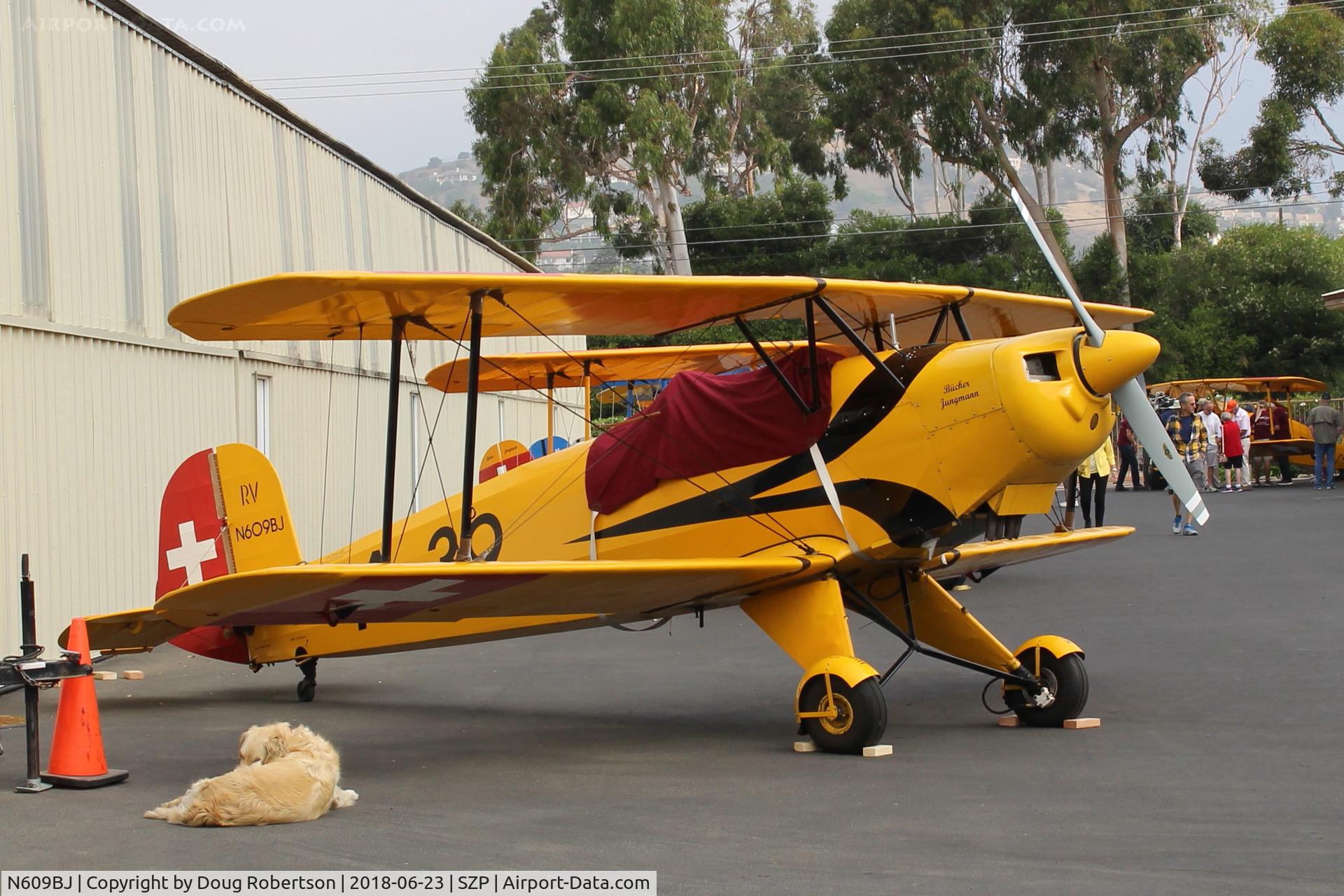 N609BJ, 1963 CASA 1-131 Jungmann C/N E3B-609, 1963 C.A.S.A. 1.131 Bucker JUNGMANN, Lycoming IO-360 180 Hp upgrade conversion, with Winnie, the Mason's airport dog.