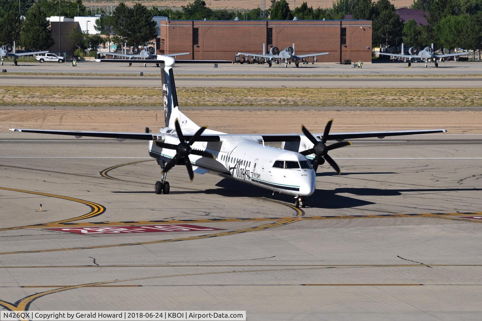 N426QX, 2007 Bombardier DHC-8-402 Dash 8 C/N 4154, Coming off RWY 10L onto the Alaska ramp.