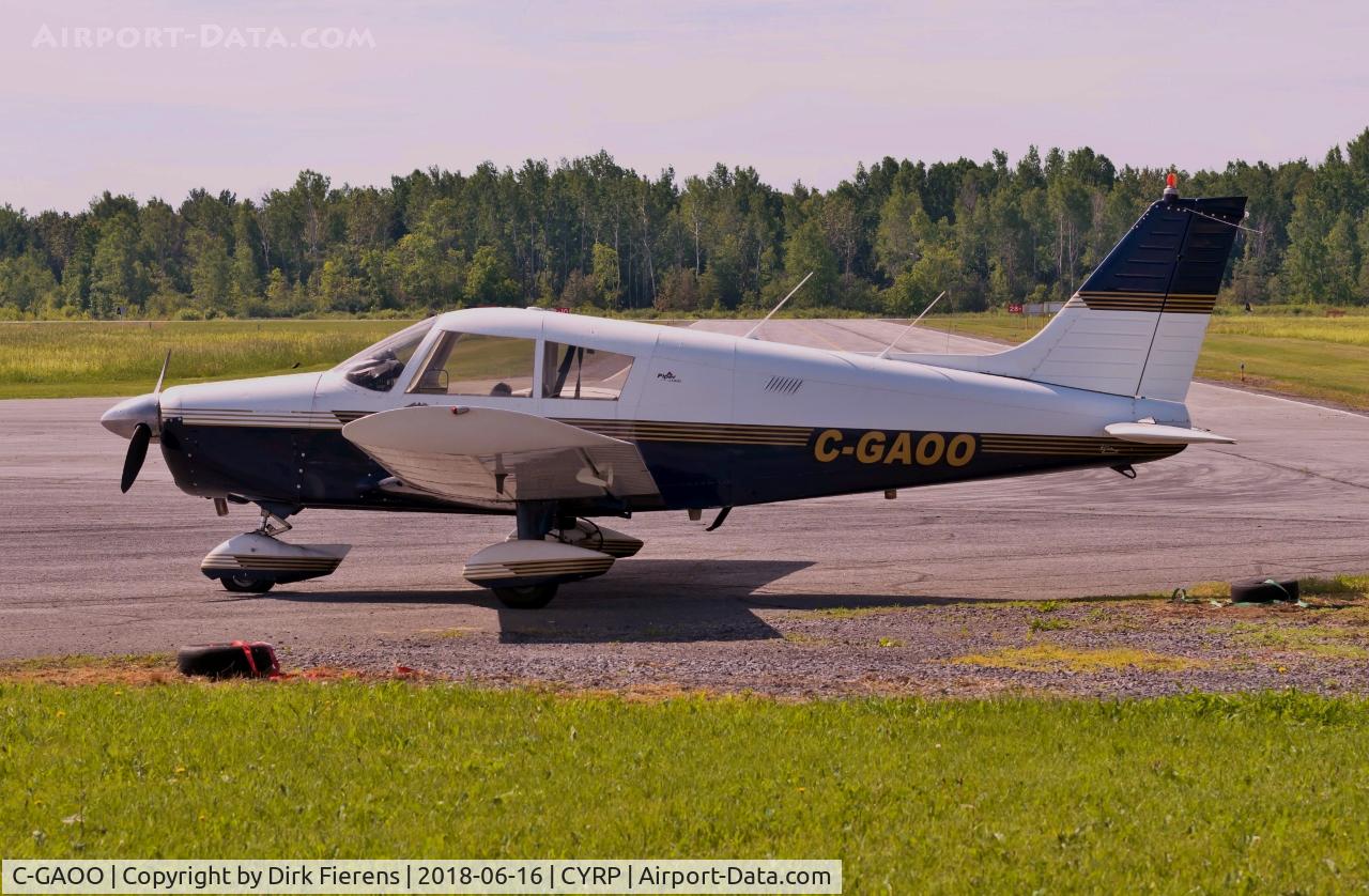 C-GAOO, 1973 Piper PA-28-140 C/N 287325522, Parked in front of the hangars.