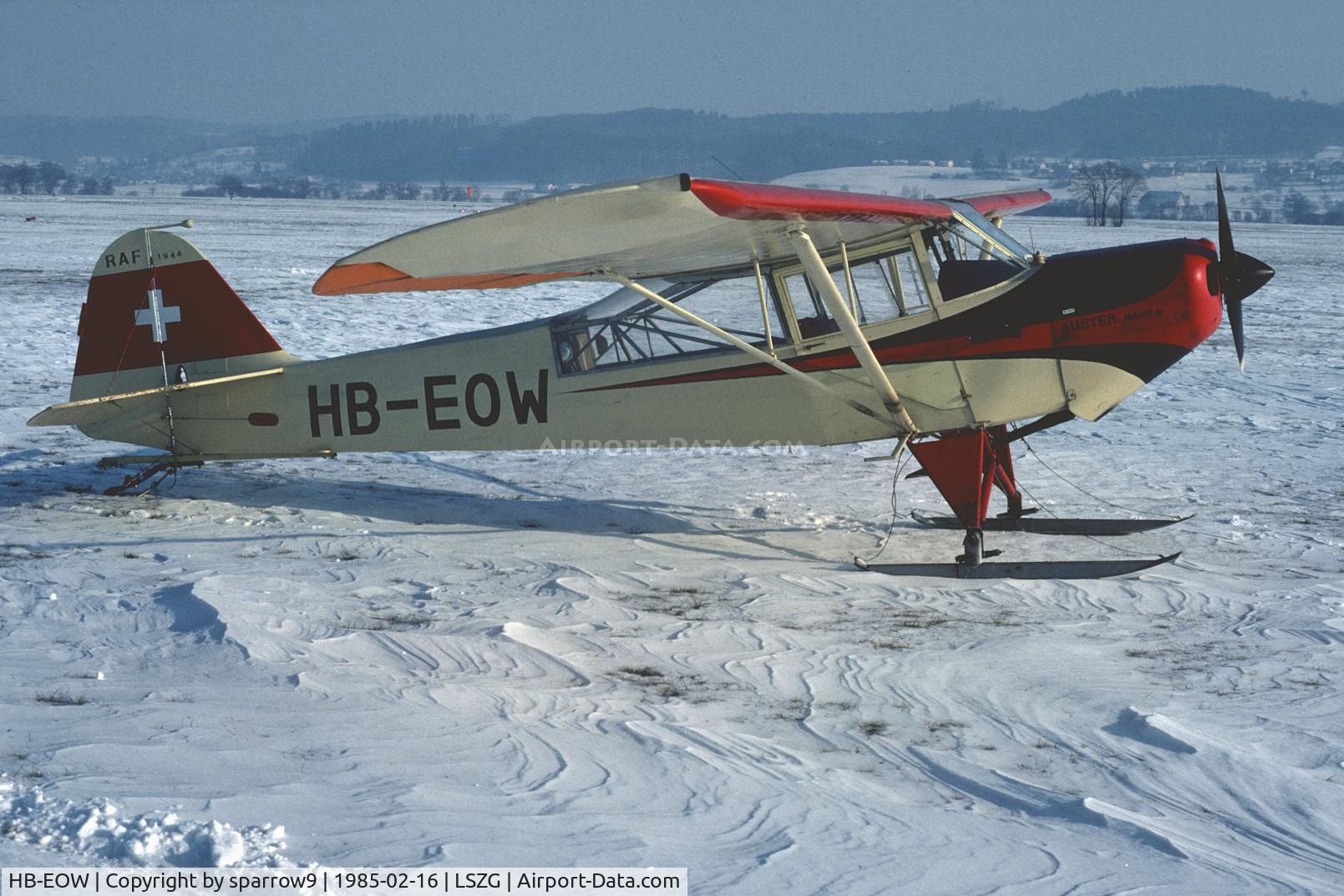 HB-EOW, 1944 Taylorcraft J Auster 5 C/N 1004, On a sunny winter afternoon at Grenchen. Registered since 1947-11-28. Scanned from a slide.