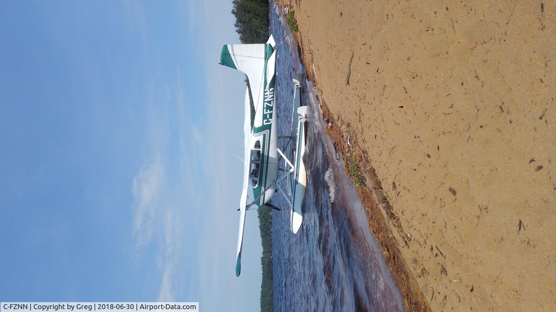 C-FZNN, 1970 Cessna A185E Skywagon 185 C/N 18501830, On the beach at lake clear ny.