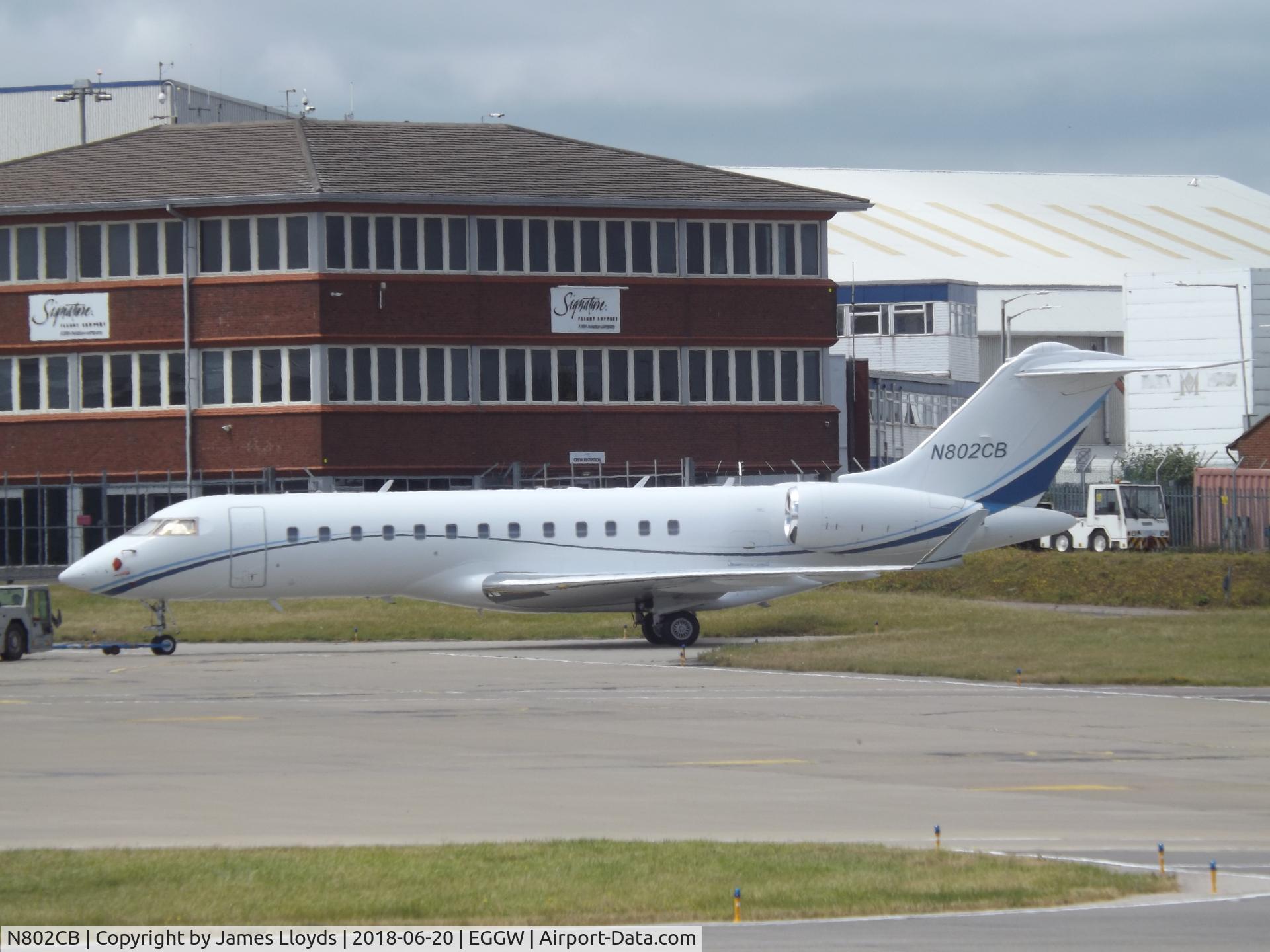 N802CB, 1999 Bombardier BD-700-1A10 Global Express C/N 9041, Being pushed away from the Gulfstream Apron.