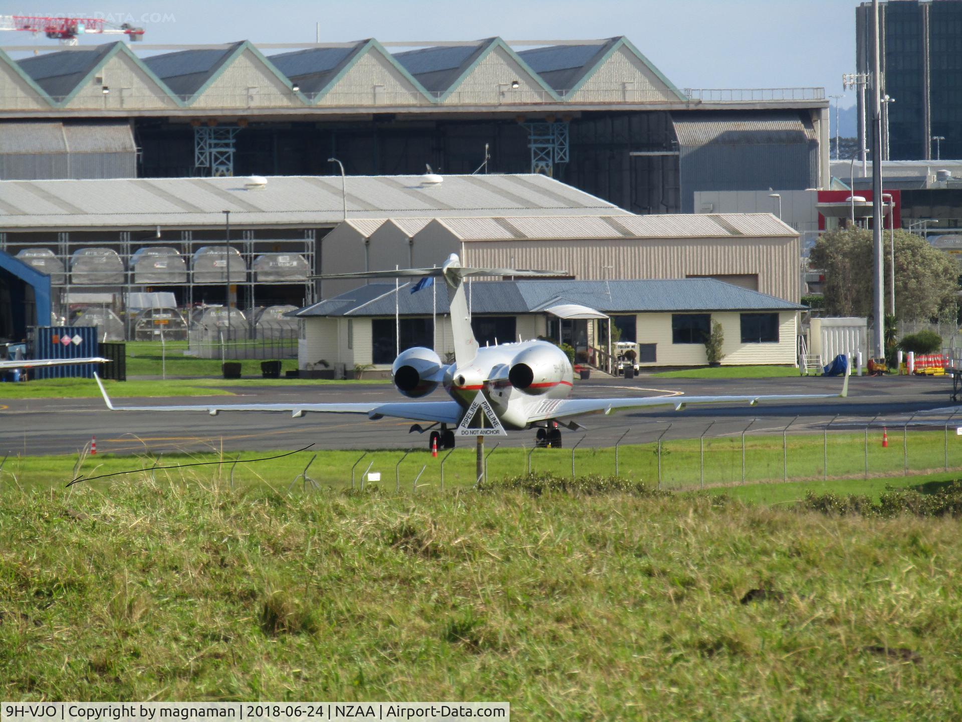 9H-VJO, 2015 Bombardier BD 700-1A10 Global 6000 C/N 9669, Long shot from viewing parking area off Puhinui Road