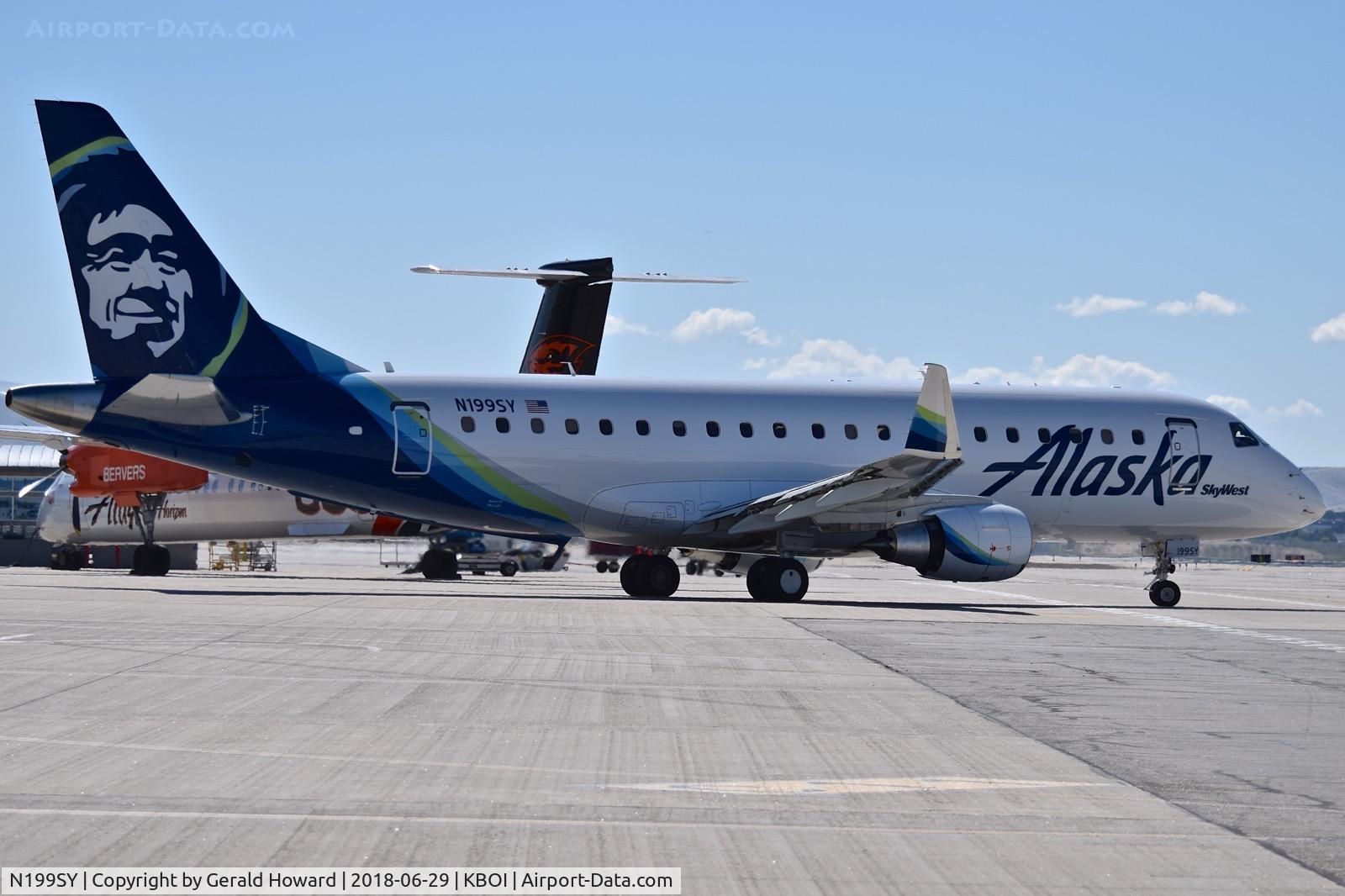 N199SY, 2018 Embraer 175LR (ERJ-170-200LR) C/N 17000730, Taxiing from the Alaska ramp.