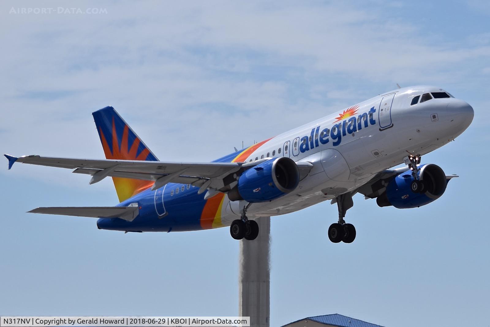 N317NV, 2005 Airbus A319-111 C/N 2477, Climb out from RWY 28R.