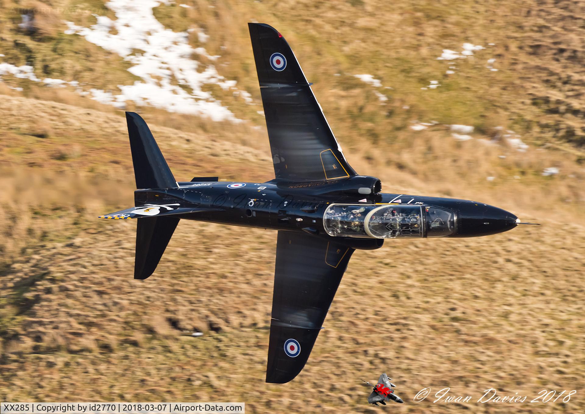 XX285, 1979 Hawker Siddeley Hawk T.1A C/N 111/312110, Knife edging through a Welsh valley.