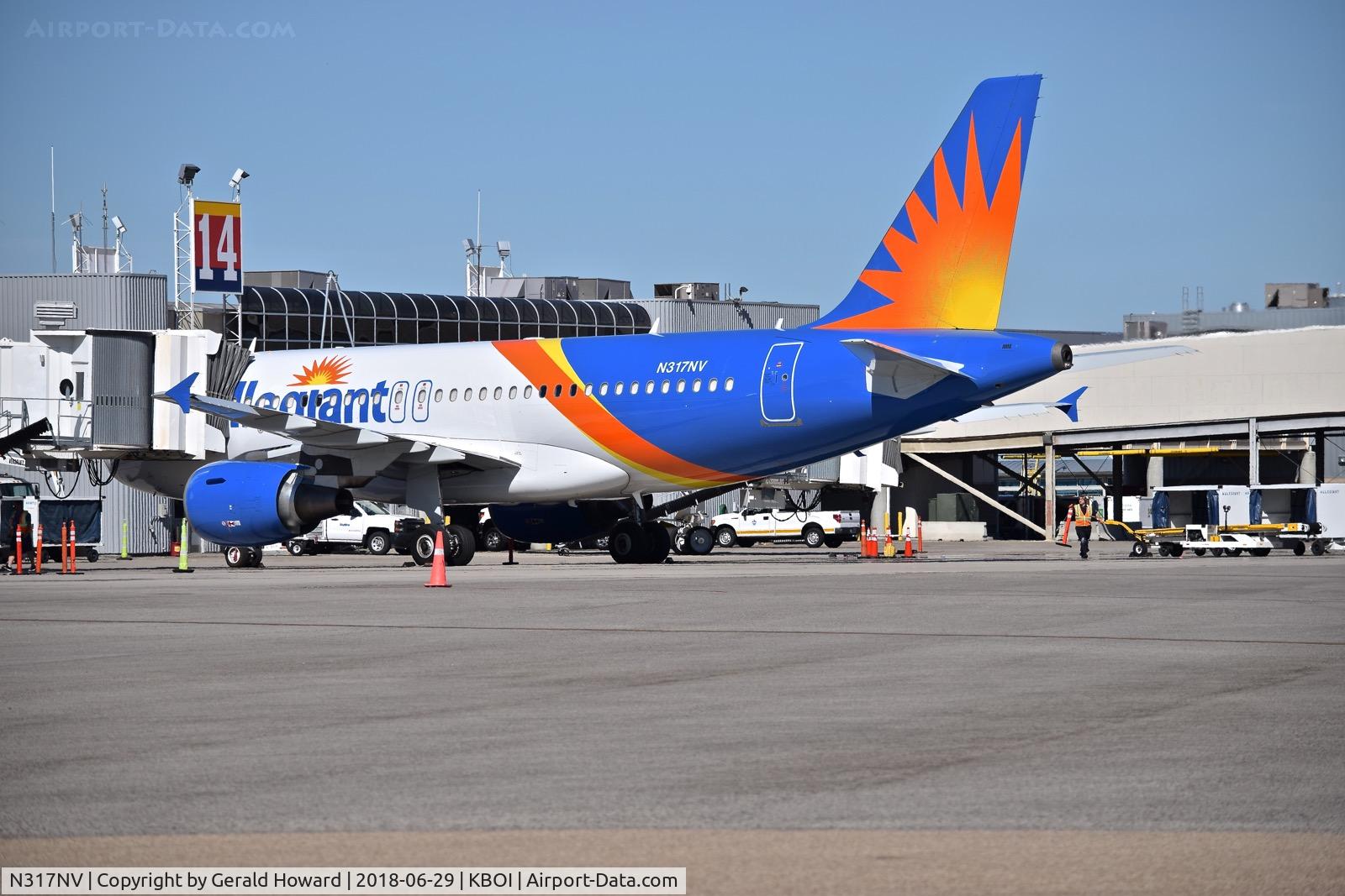 N317NV, 2005 Airbus A319-111 C/N 2477, Parked at the gate.