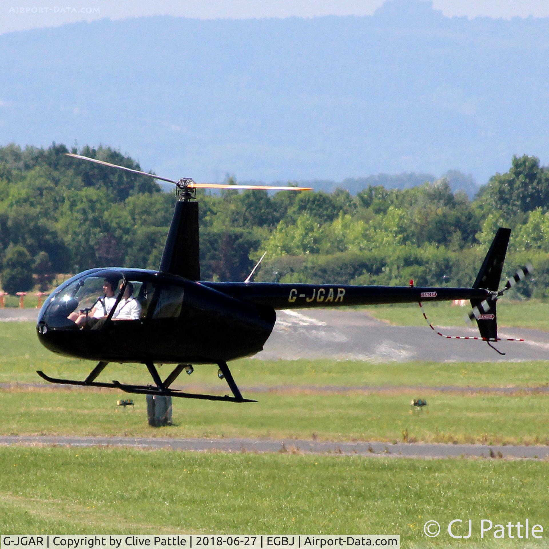 G-JGAR, 2004 Robinson R44 Raven II C/N 10513, Landing at EGBJ