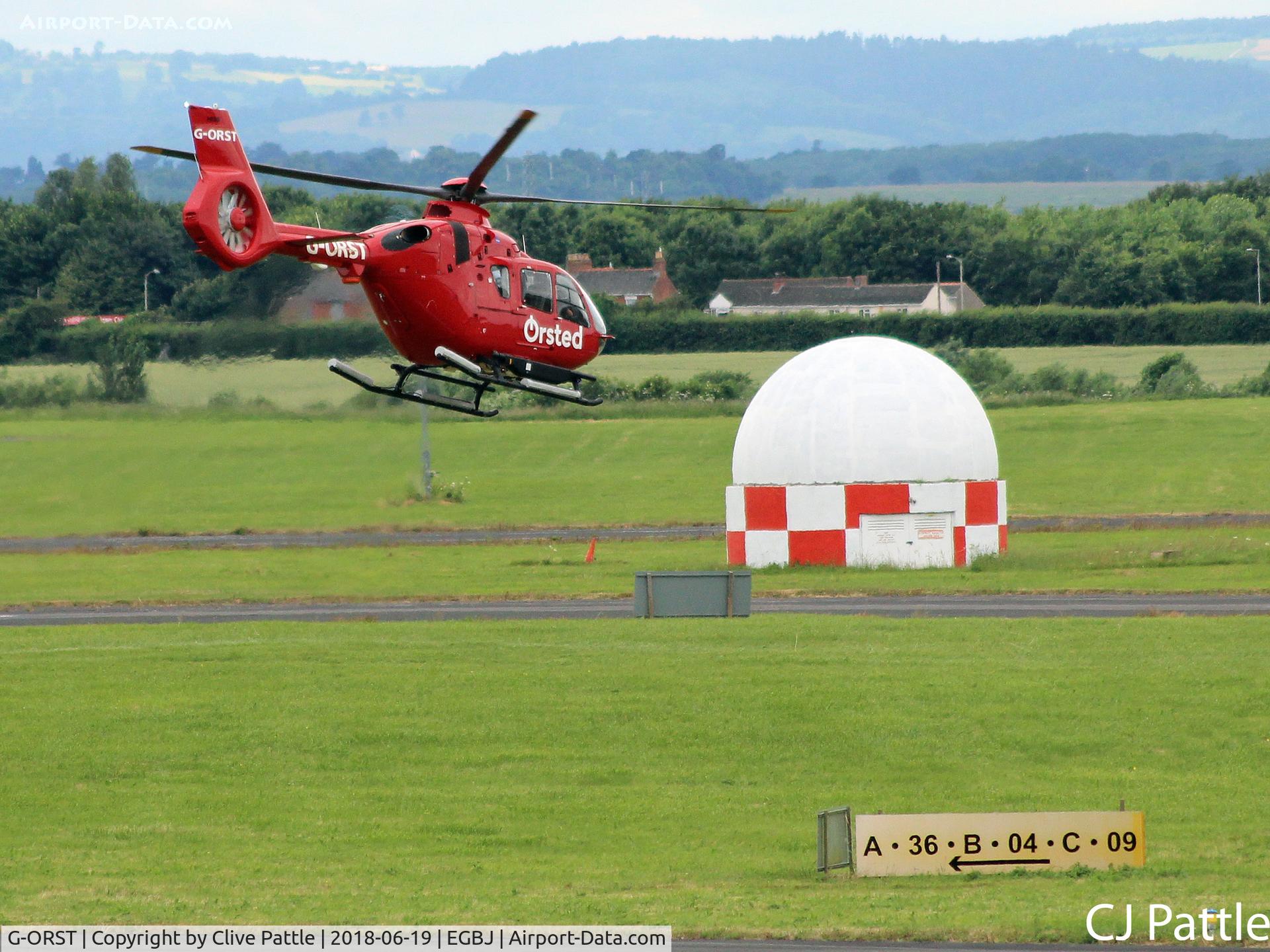 G-ORST, 2017 Airbus Helicopters EC-135T-3 C/N 1269, Over the field at Staverton