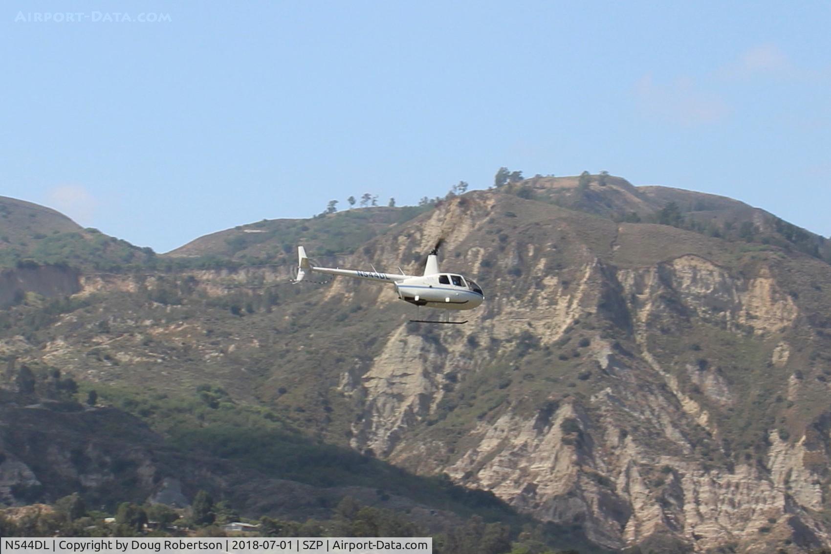 N544DL, 2005 Robinson R44 Raven II C/N 10783, 2005 Robinson R44 RAVEN II, Lycoming IO-540-AE1A5 260 Hp derated to 225 Hp for takeoff, 205 Hp continuous, approaching home hangar at SZP from river route.