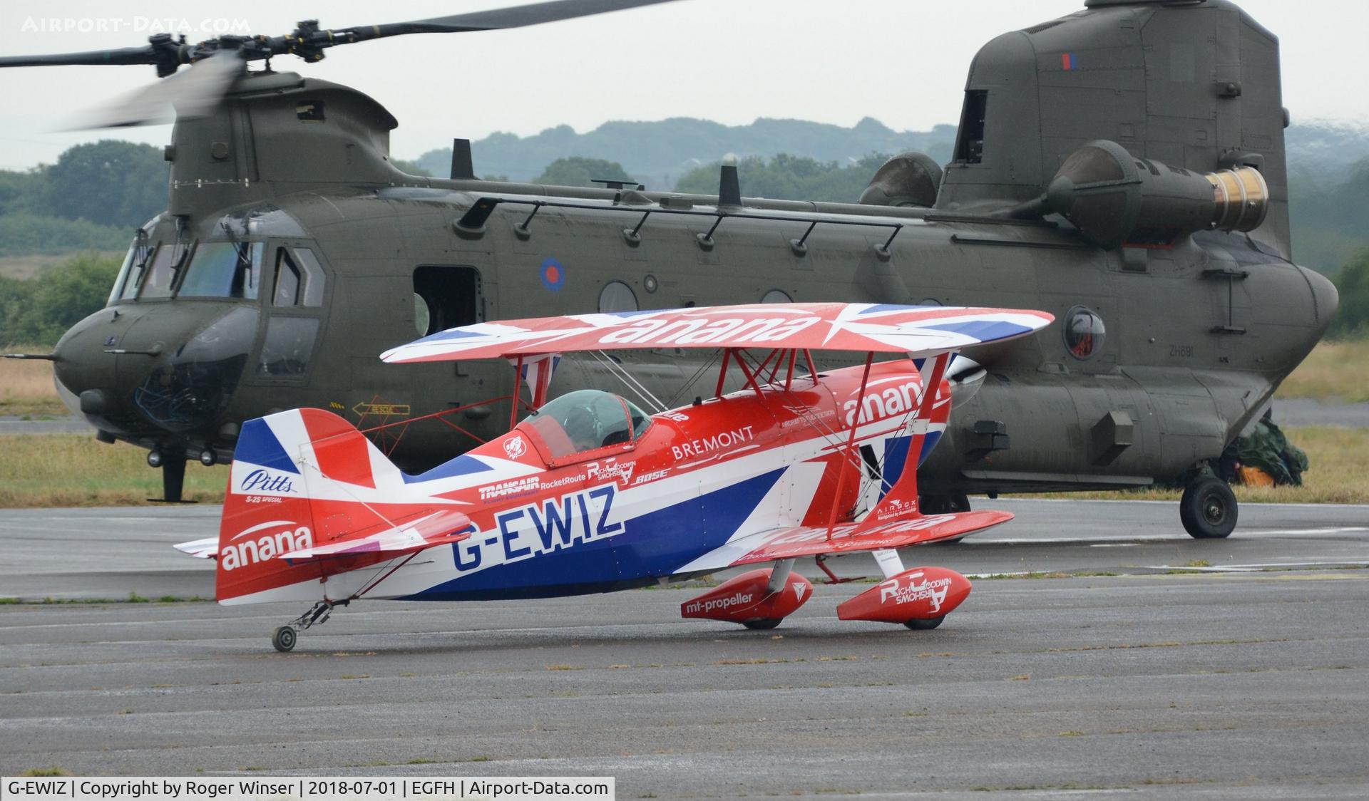 G-EWIZ, 1981 Pitts S-2S Special C/N S18, Visiting Pitts Special biplane about to depart and display on day 2 of WNAS18. RAF Chjinook HC.6A helicopter ZH891 in the background.