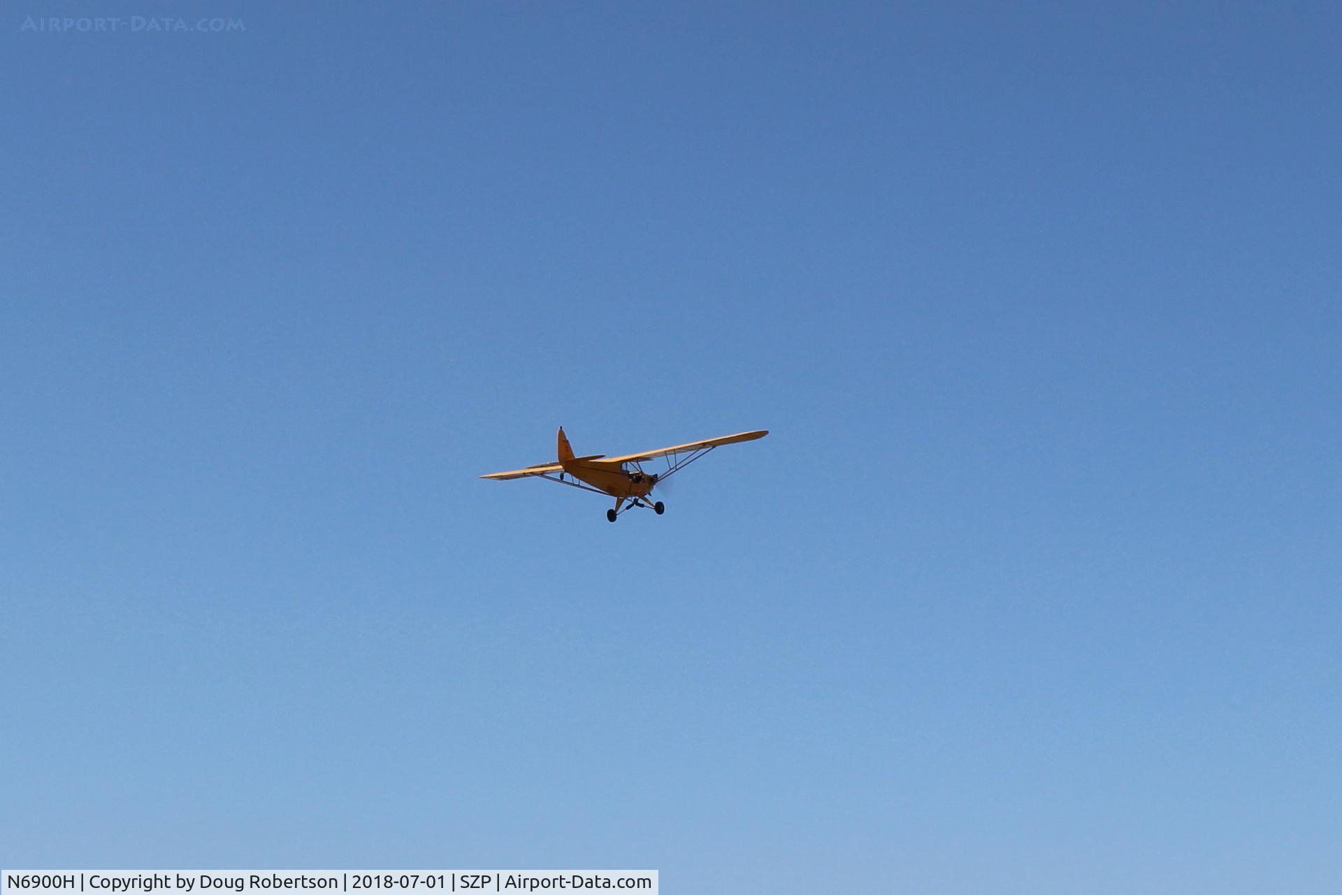 N6900H, 1946 Piper J3C-65 Cub Cub C/N 20129, 1946 Piper J3C-65 CUB, Lycoming O-290 135 Hp upgrade, takeoff climb Rwy 22
