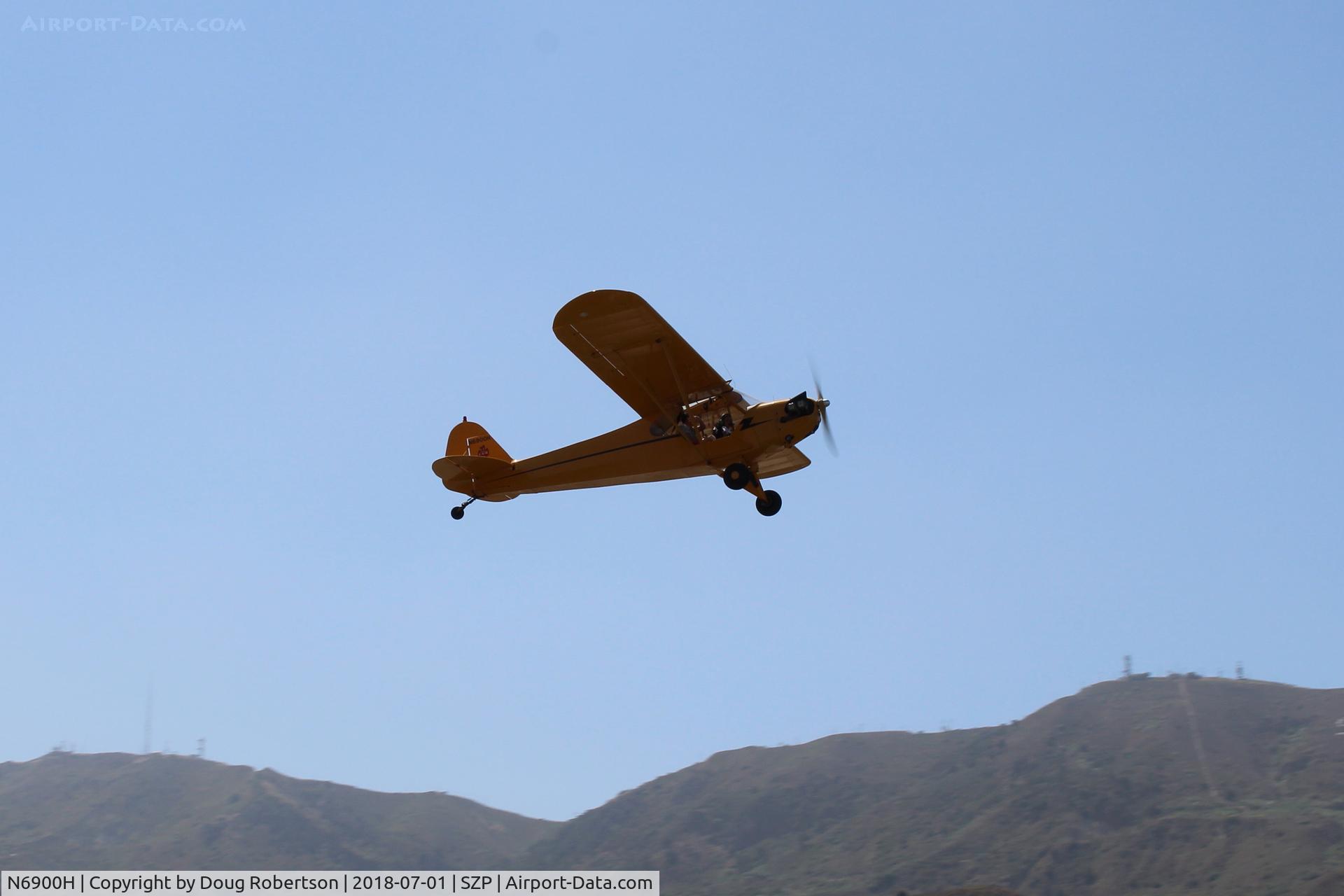 N6900H, 1946 Piper J3C-65 Cub Cub C/N 20129, 1946 Piper J3C-65 CUB, Lycoming O-290 135 Hp big upgrade by STC, takeoff climb Rwy 22