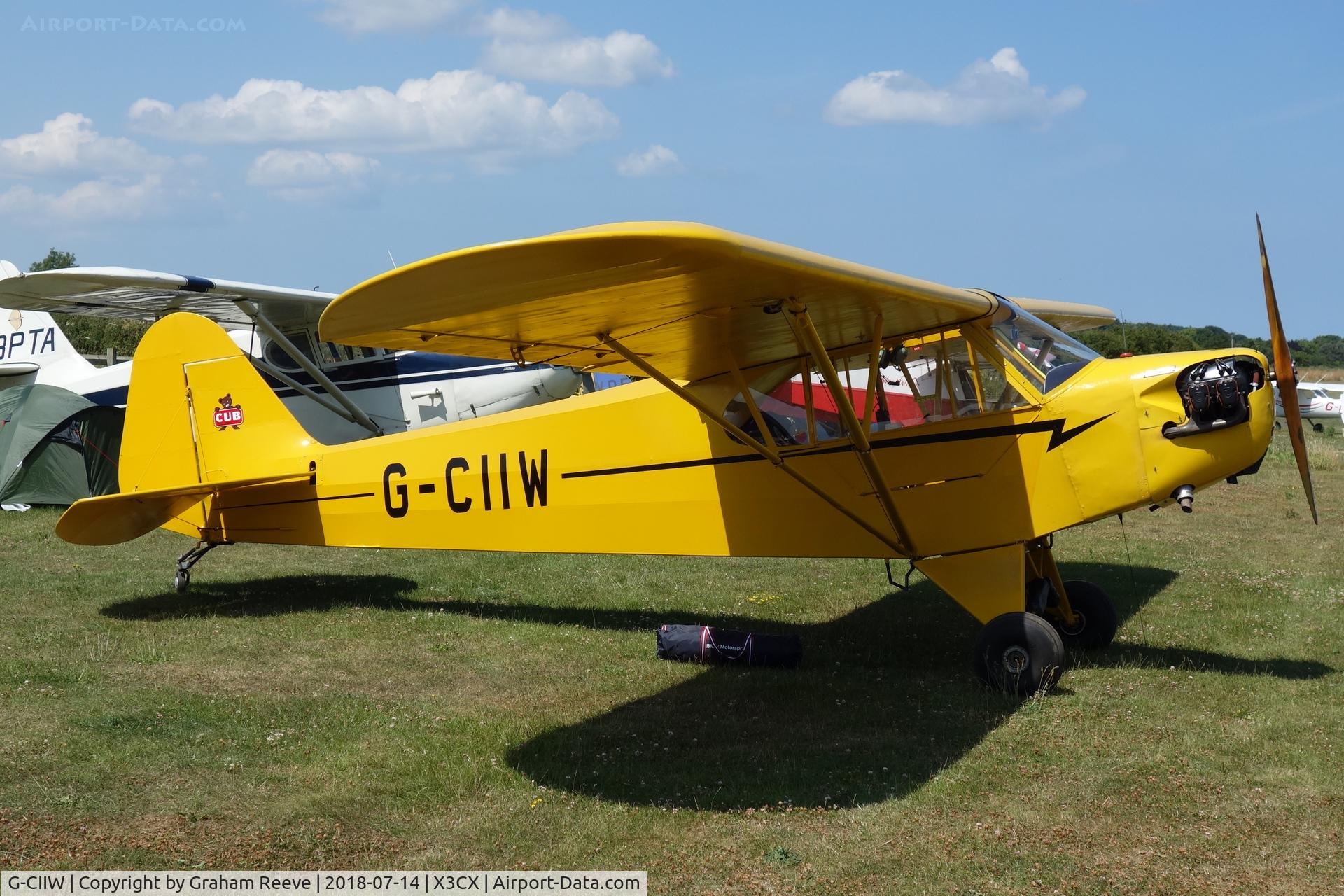 G-CIIW, 1939 Piper J3L-65 Cub C/N 3372, Parked at Northrepps.