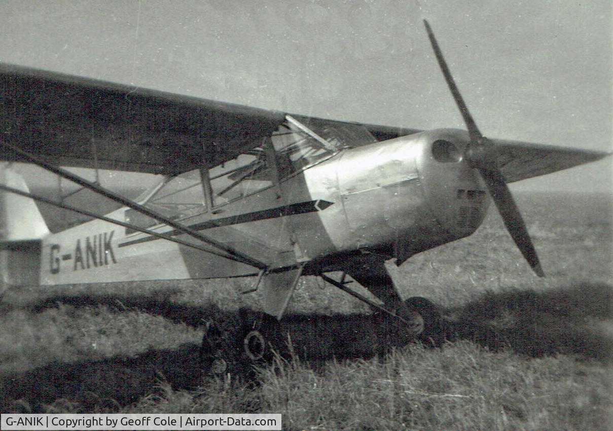 G-ANIK, Taylorcraft J Auster 5 C/N 1674, I forget who owned it but I made my first ever flight in this aircraft - it was a three seater, the third being a small swivel bucket type seat behind the pilot.  The photo is sadly in poor condition but is the best of 3.