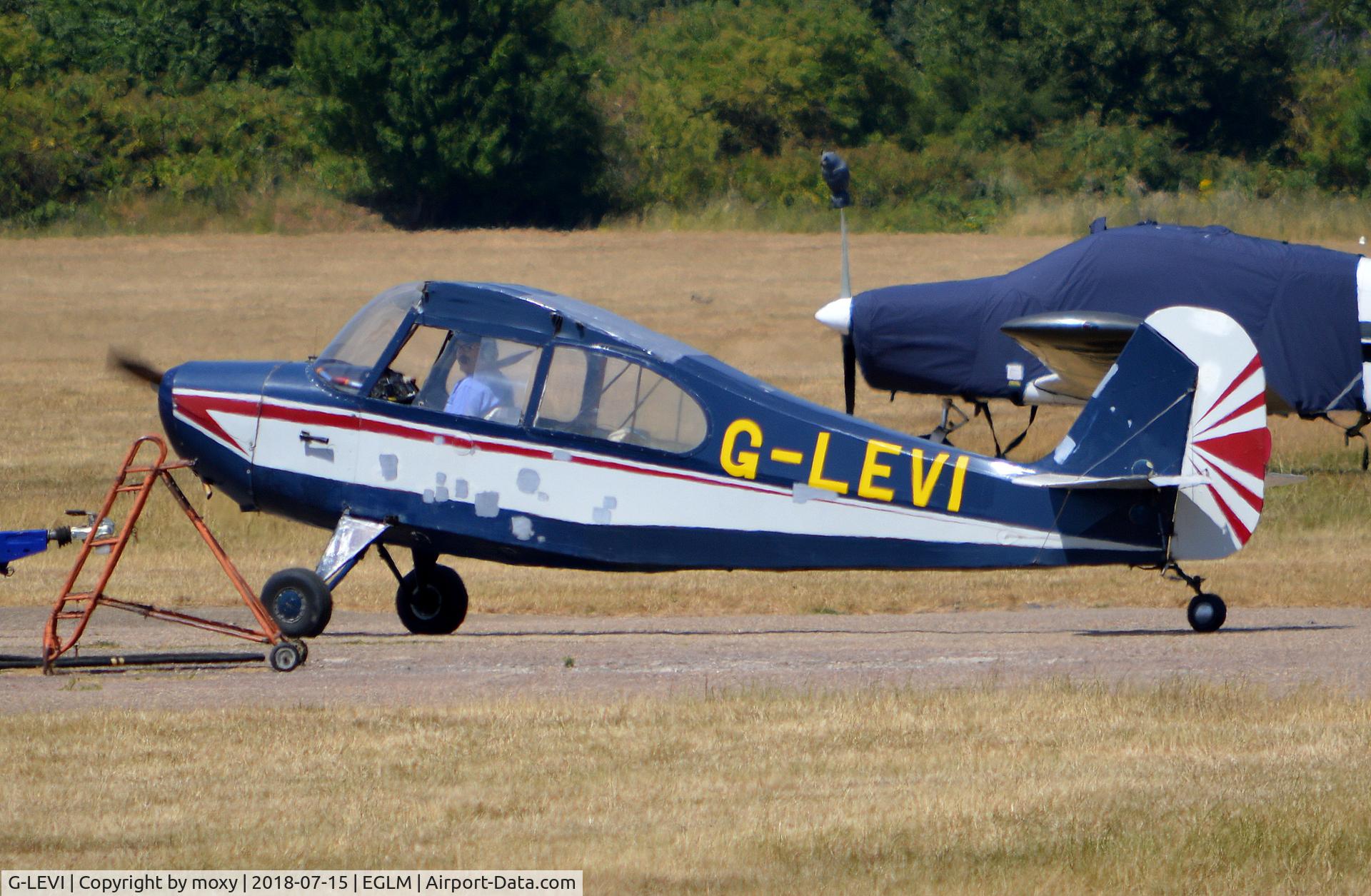 G-LEVI, 1946 Aeronca 7AC Champion C/N 7AC-4001, Aeronca 7AC Champion at White Waltham. Ex N85266. Hope he doesn't intend to attempt a take off and remembers he has no wings.