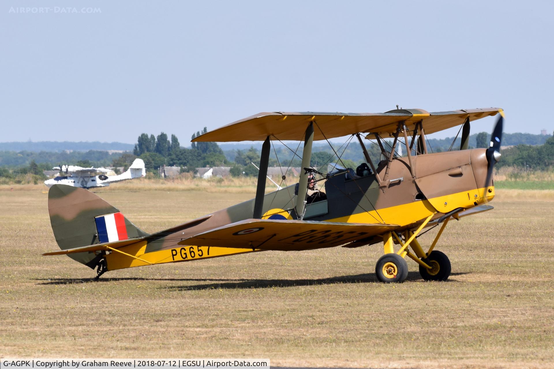 G-AGPK, 1945 De Havilland DH-82A Tiger Moth II C/N 86566, About to depart from Duxford.