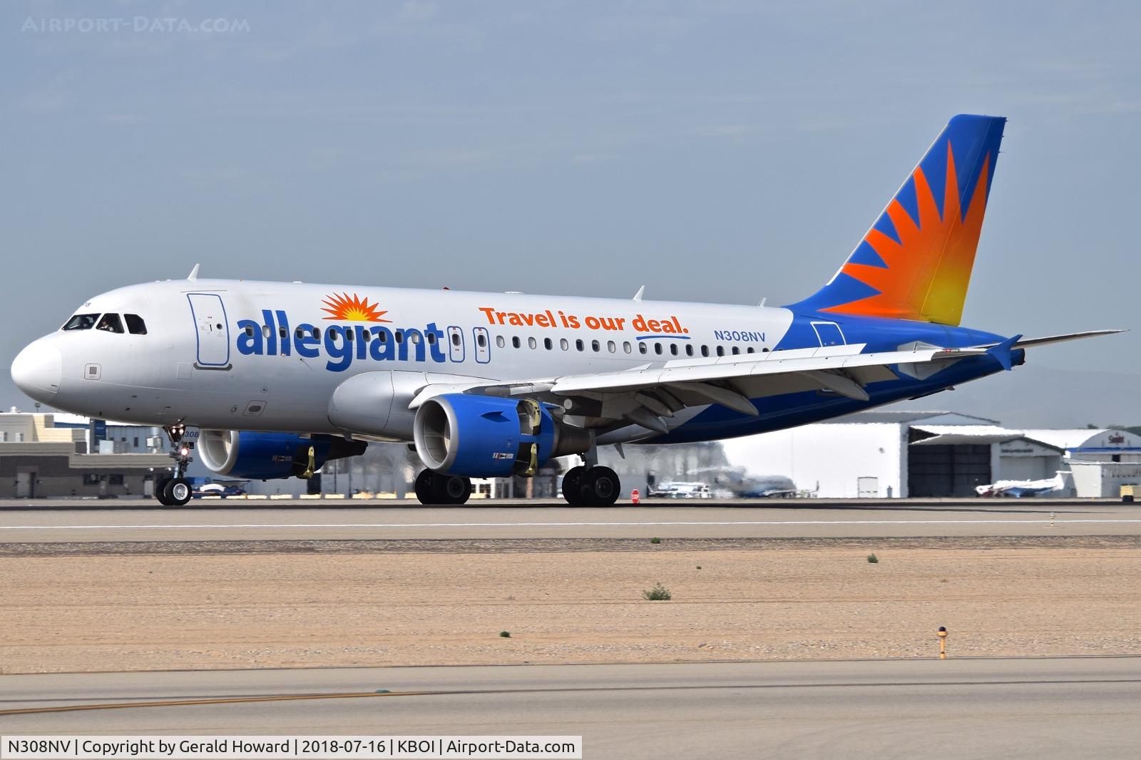 N308NV, 2005 Airbus A319-111 C/N 2450, Landing roll out with reverse thrusters open. RWY 10L.
