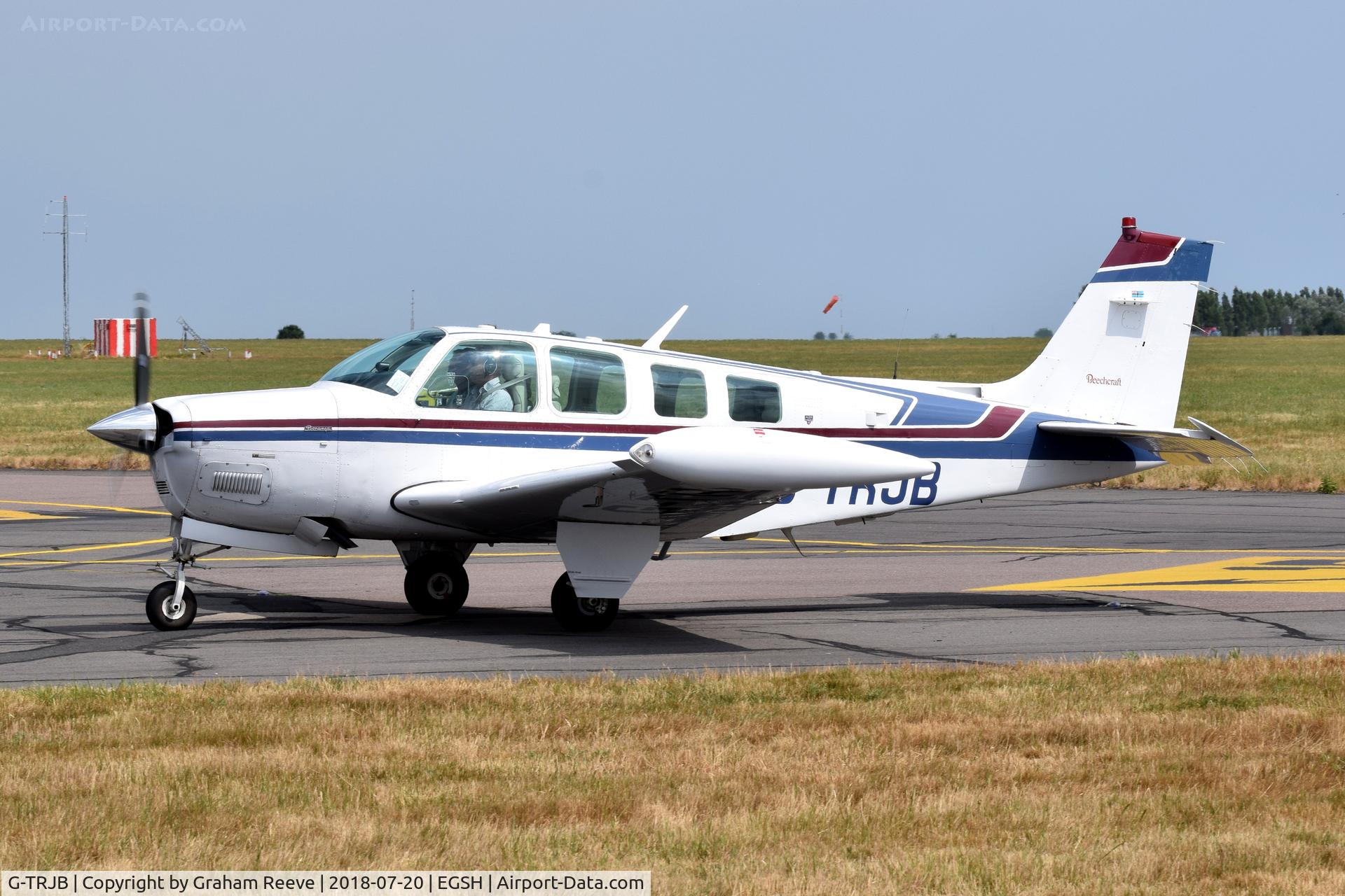 G-TRJB, 1992 Beech A36 Bonanza 36 C/N E-2719, Just landed at Norwich