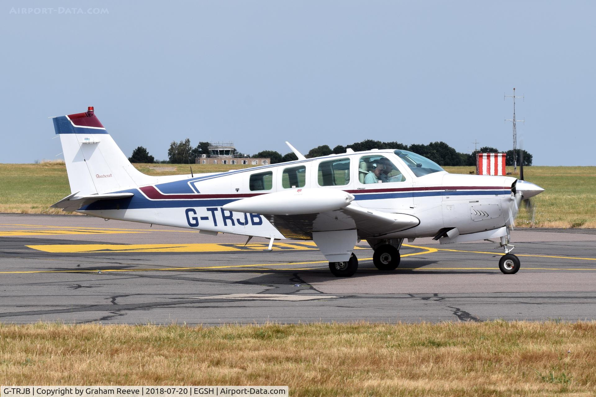 G-TRJB, 1992 Beech A36 Bonanza 36 C/N E-2719, Departing from Norwich.