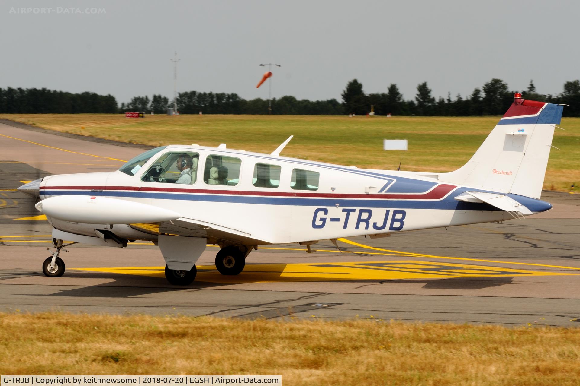 G-TRJB, 1992 Beech A36 Bonanza 36 C/N E-2719, Arriving at Norwich.