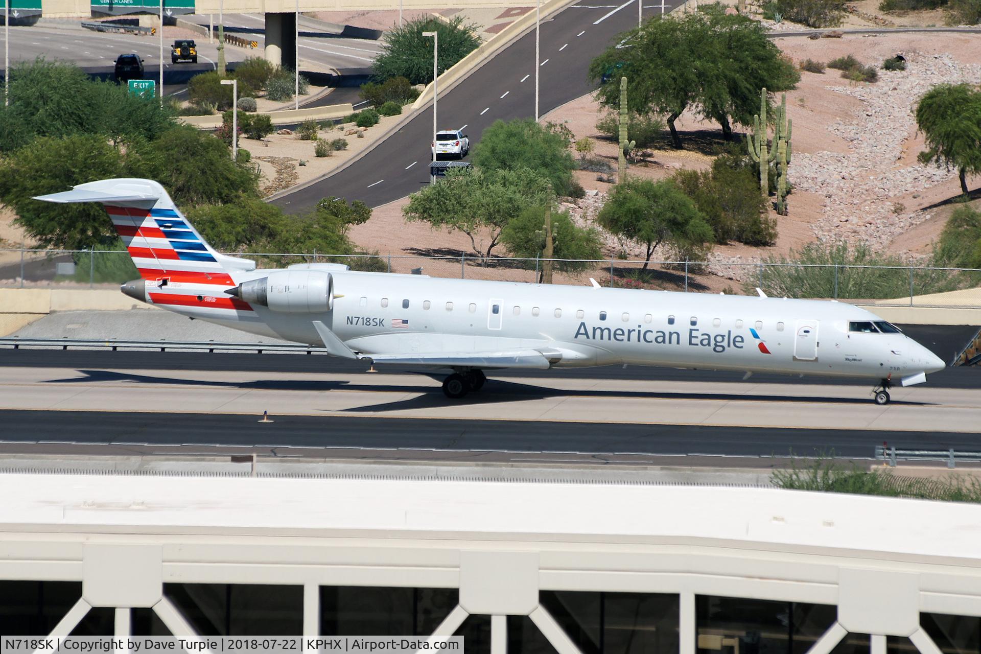 N718SK, 2004 Bombardier CRJ-701 (CL-600-2C10) Regional Jet C/N 10184, No comment.