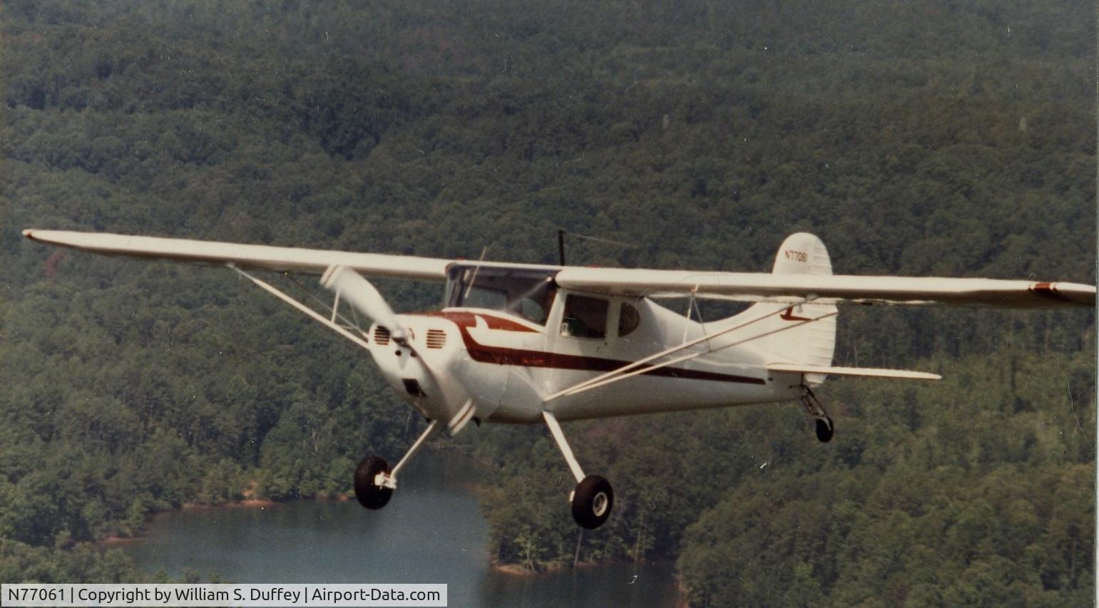 N77061, 1946 Cessna 140 C/N 11515, N77061 owned and flown by Guy Byars in 1983 over Lake Hartwell near Clemson SC