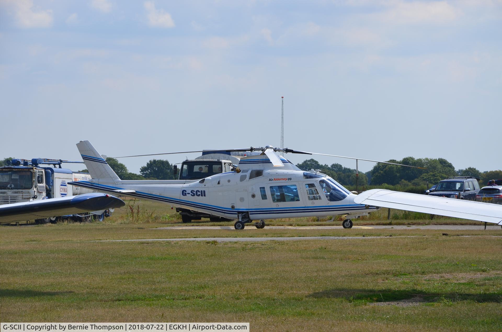 G-SCII, 1990 Agusta A-109C C/N 7628, Seen at Headcorn Airfield Kent.