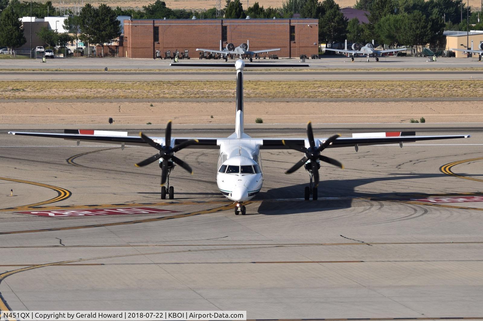 N451QX, 2013 Bombardier DHC-8-402 Dash 8 C/N 4457, Taxiing onto the Alaska ramp.