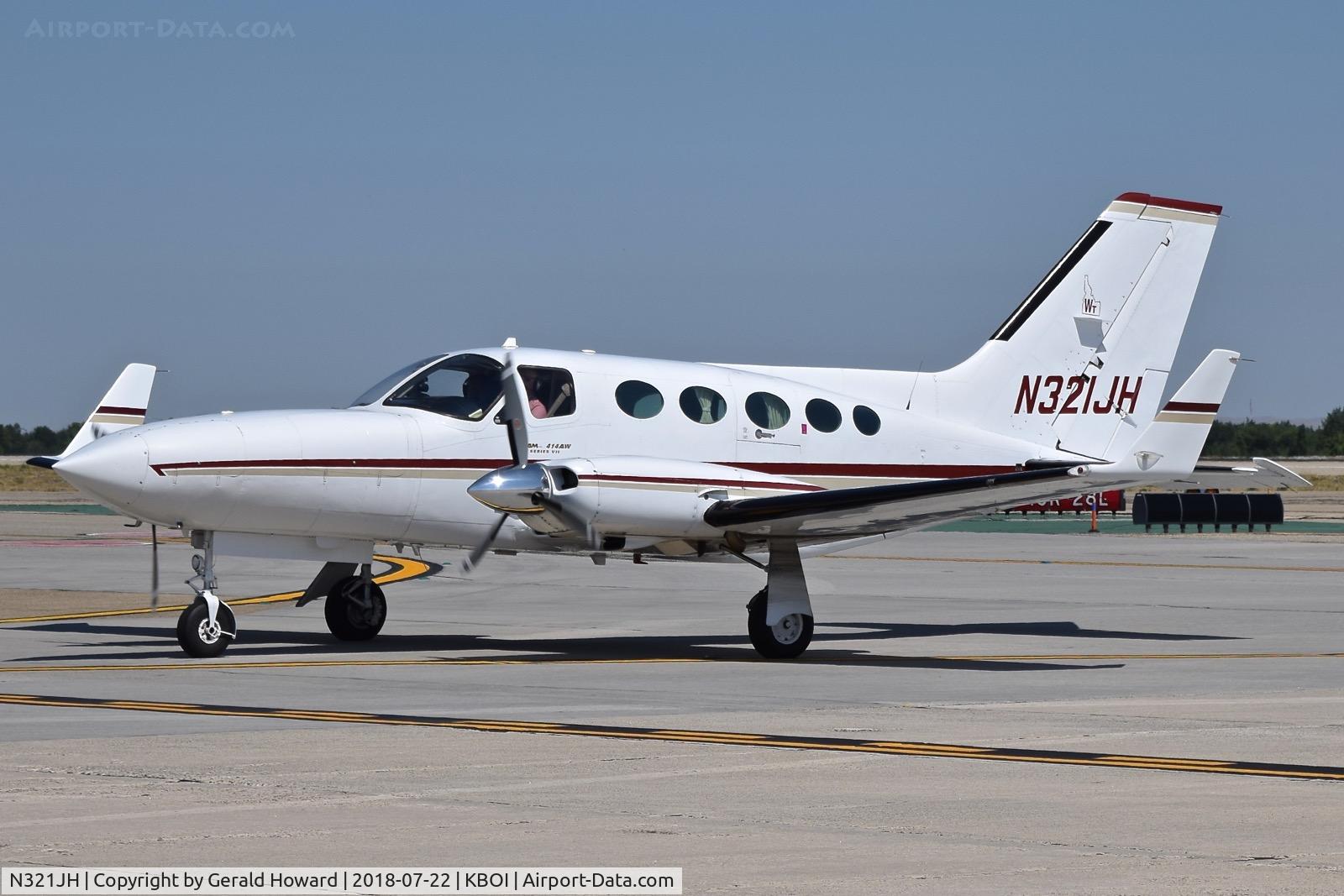 N321JH, 1978 Cessna 414A Chancellor C/N 414A0063, Taxiing off Bravo for the south GA ramp.