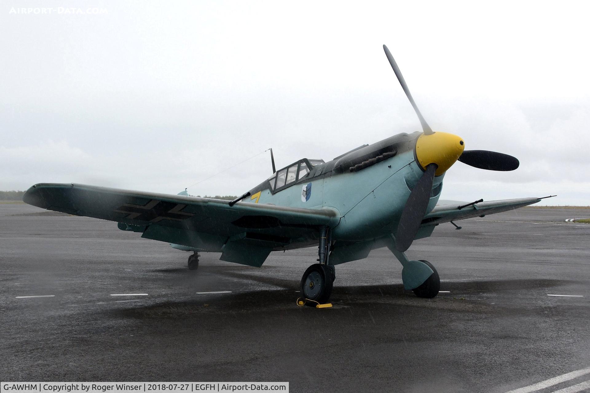 G-AWHM, 1958 Hispano HA-1112-M1L Buchon C/N 187, Visiting Buchon in the markings of Messerschmitt Bf 109 aircraft Yellow 7 of JG.26.