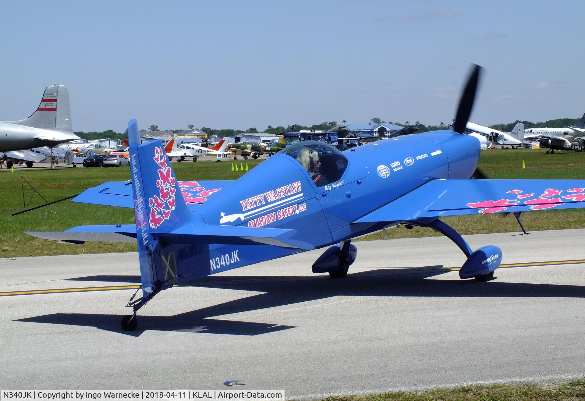 N340JK, 2015 Extra EA-300SC C/N SC056, Patty Wagstaff with her Extra EA-300SC at 2018 Sun 'n Fun, Lakeland FL