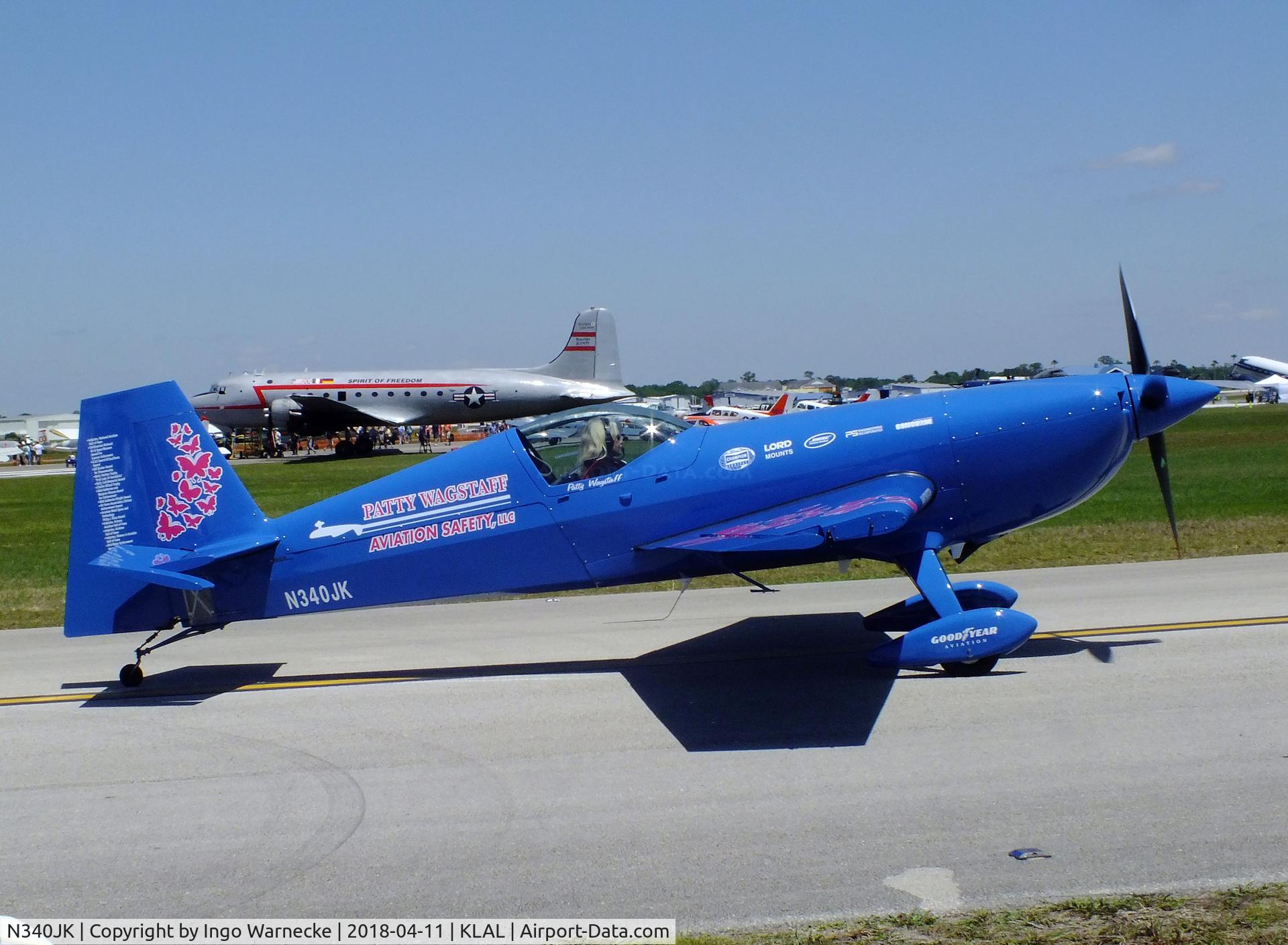 N340JK, 2015 Extra EA-300SC C/N SC056, Patty Wagstaff with her Extra EA-300SC at 2018 Sun 'n Fun, Lakeland FL