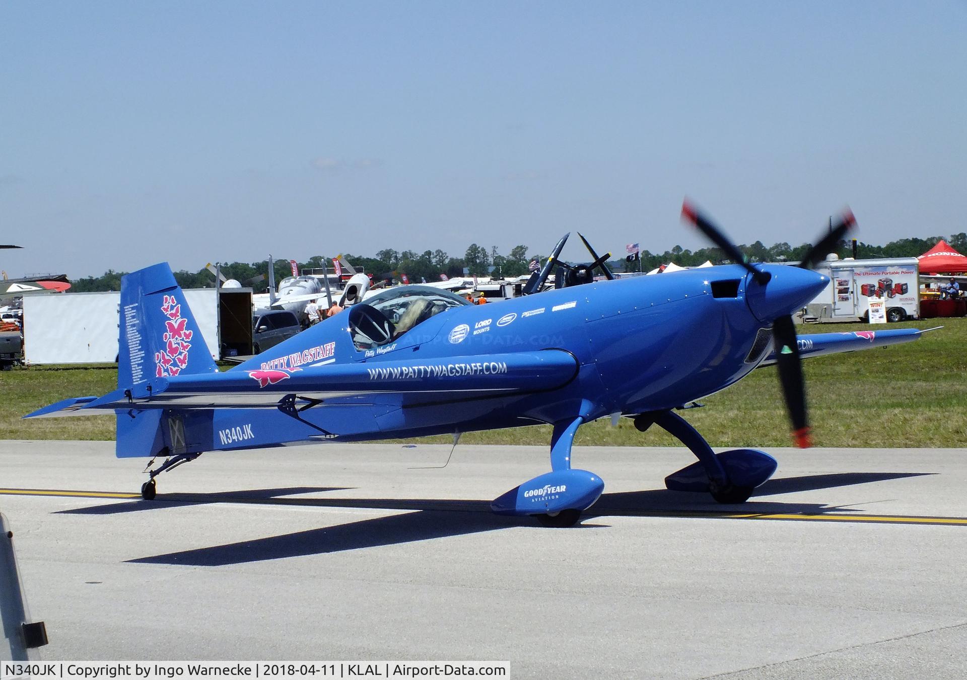 N340JK, 2015 Extra EA-300SC C/N SC056, Patty Wagstaff with her Extra EA-300SC at 2018 Sun 'n Fun, Lakeland FL