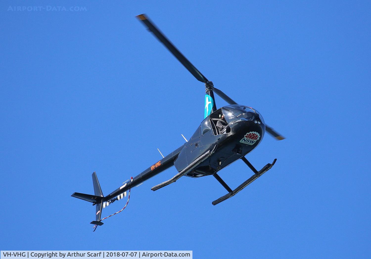 VH-VHG, 2005 Robinson R44 II C/N 10683, Overhead Muttonbird Island Coffs Harbour NSW