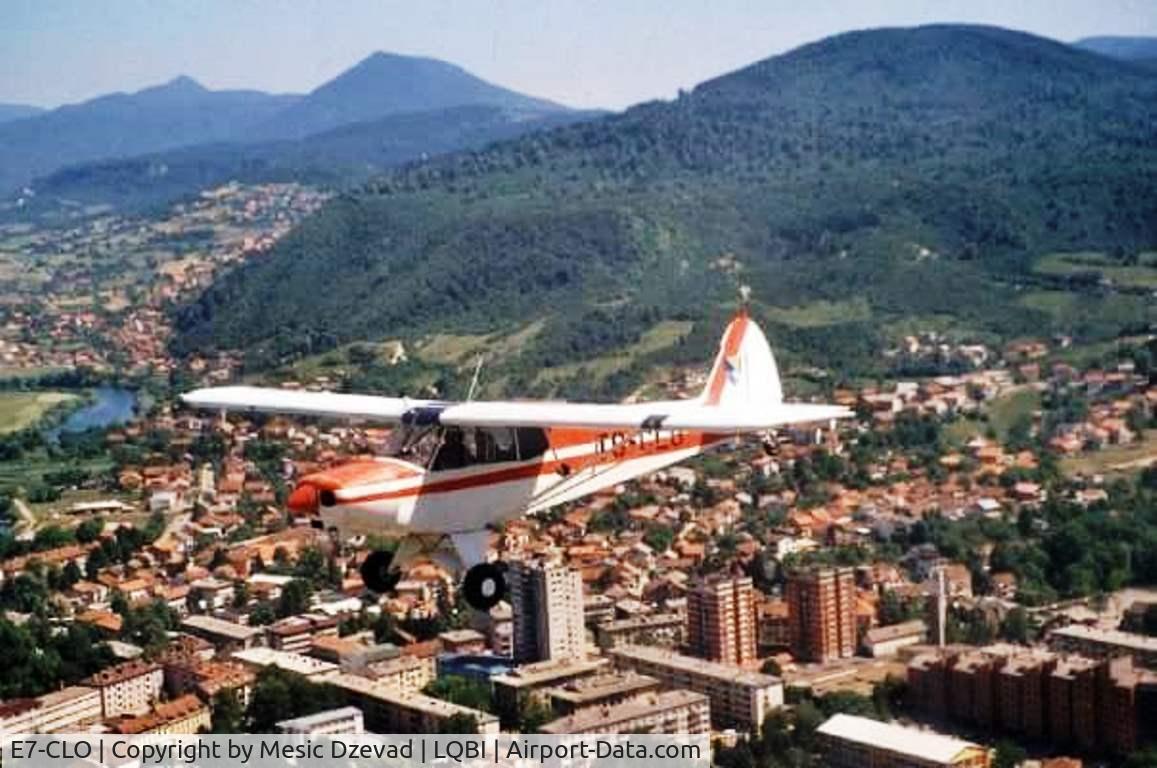 E7-CLO, 1978 Piper PA-18-150 Super Cub C/N 18-7809162, Piper PA-18-150 E7-CLO, ex T9-CLO, ex YU-DCB. In flight over Bihac.