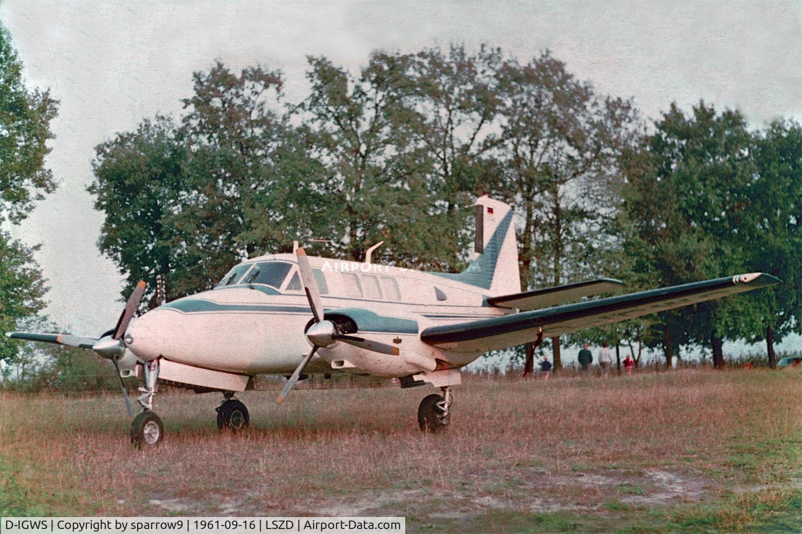 D-IGWS, 1960 Beech 65 C/N LC-47, Parked under the trees. Scanned from a Perutz-slide.