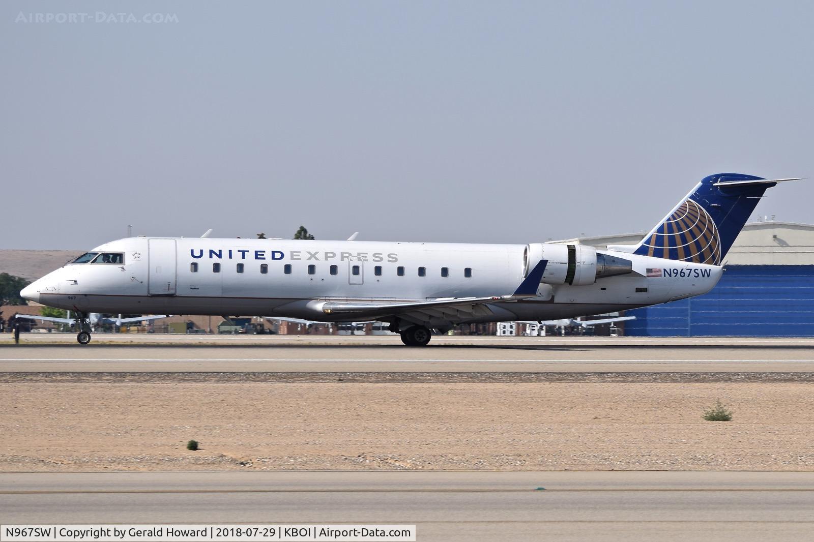 N967SW, 2003 Bombardier CRJ-200ER (CL-600-2B19) C/N 7872, Landing roll out on RWY 10L.