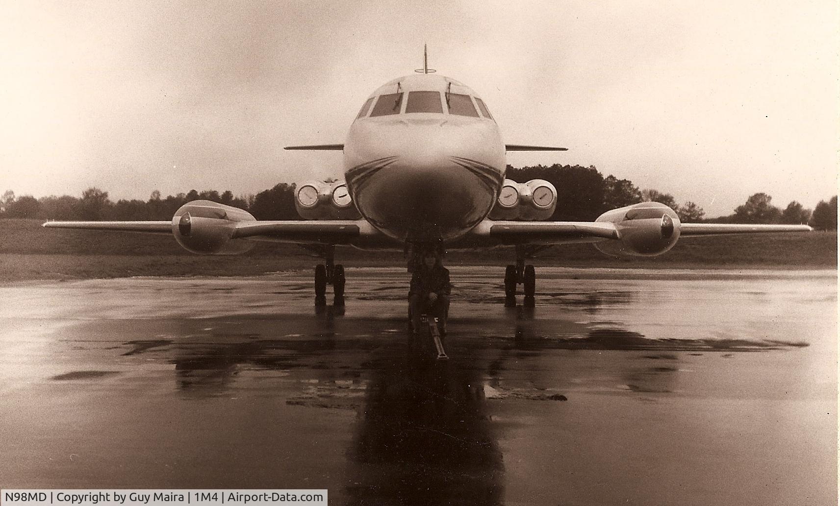 N98MD, 1964 Lockheed L-1329 Jetstar 6 C/N 5048, Great old -8 sitting at Haleyville, AL after a rainy trip.